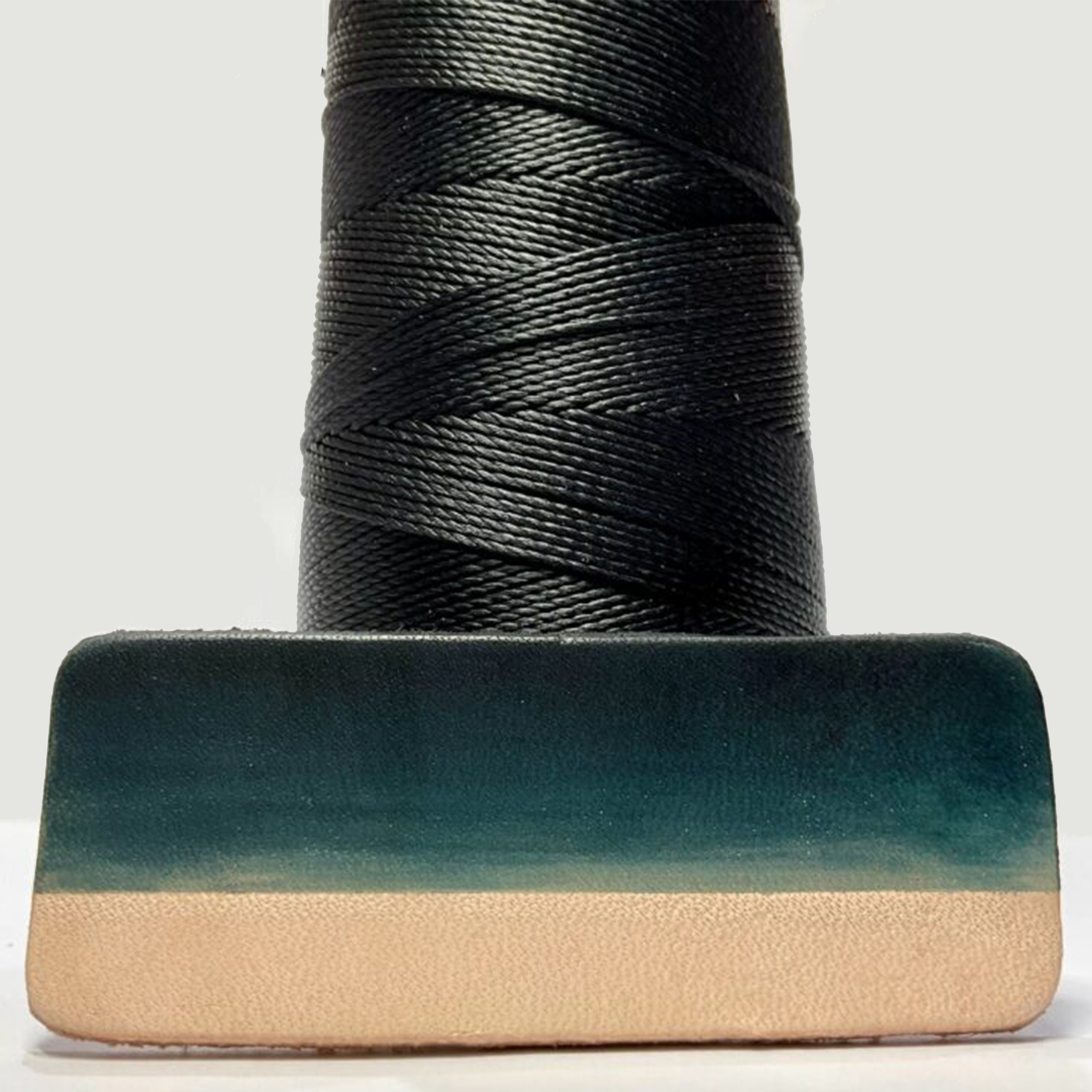 MBT black waxed polyester thread with same-color dyed leather