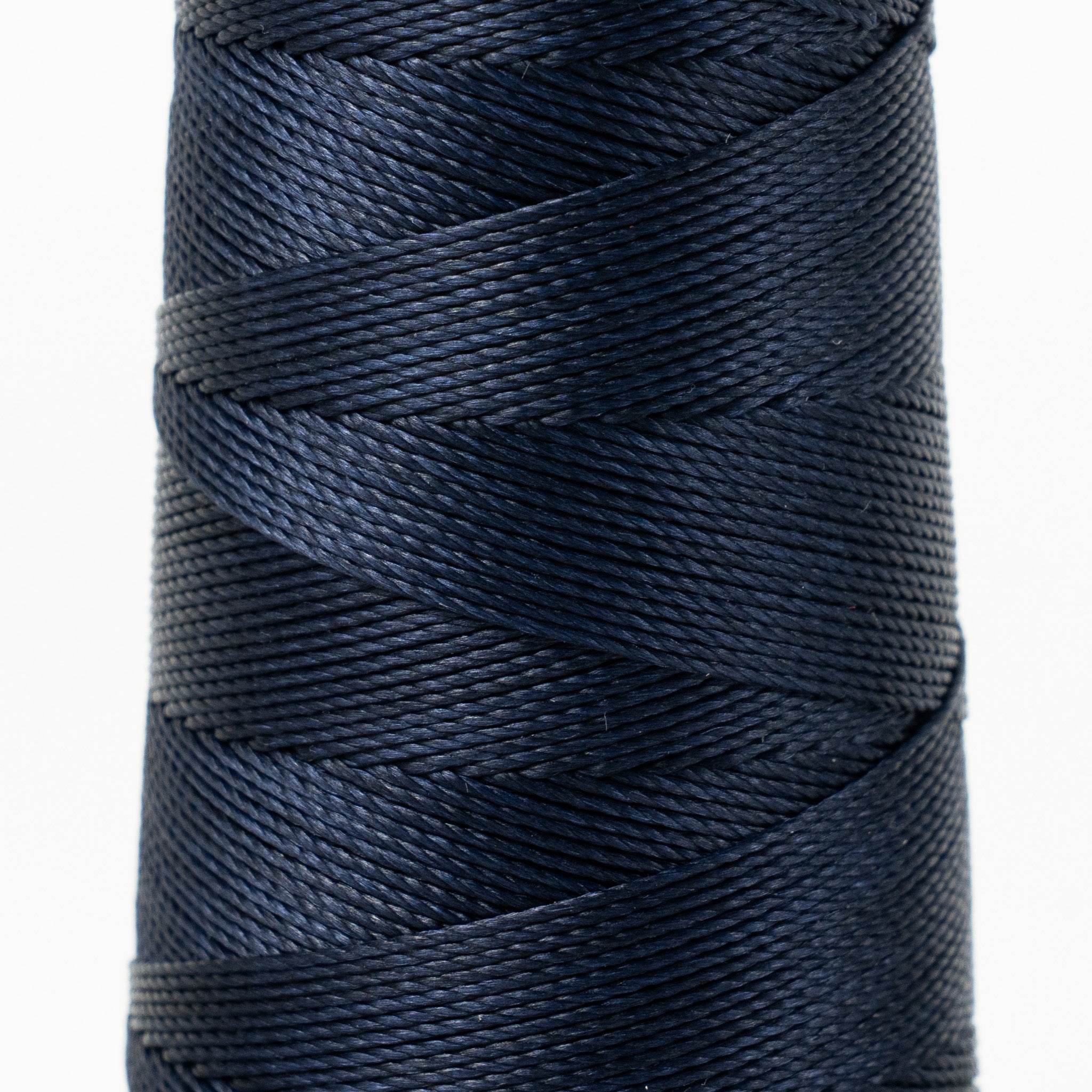 Close-up of MBT dark cerulean blue waxed polyester thread