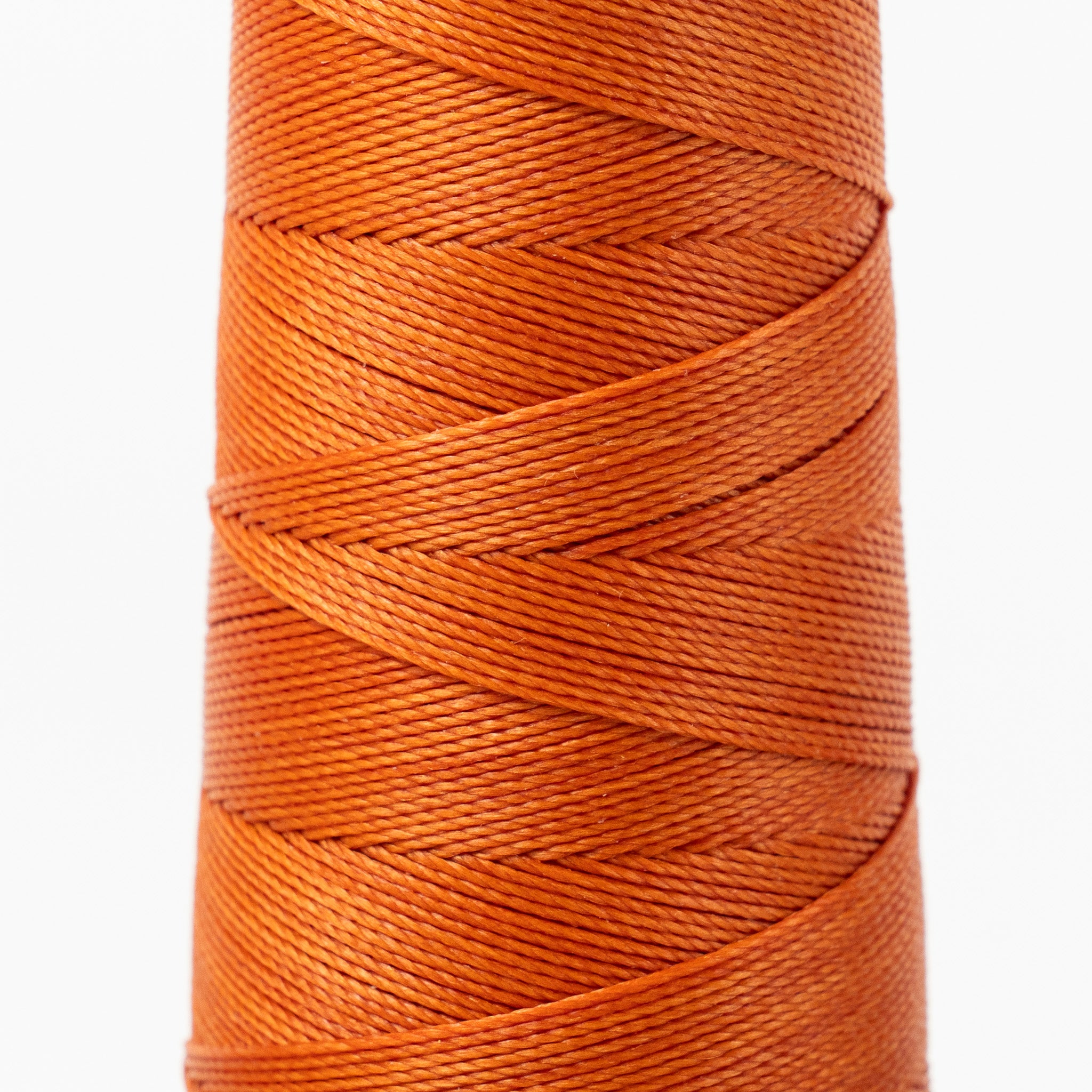Close-up of MBT fulvous waxed polyester thread
