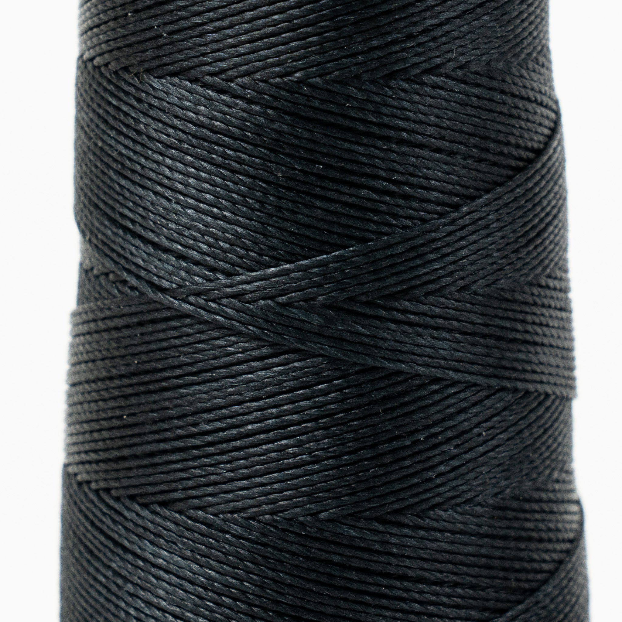 Close-up of MBT midnight green waxed polyester thread