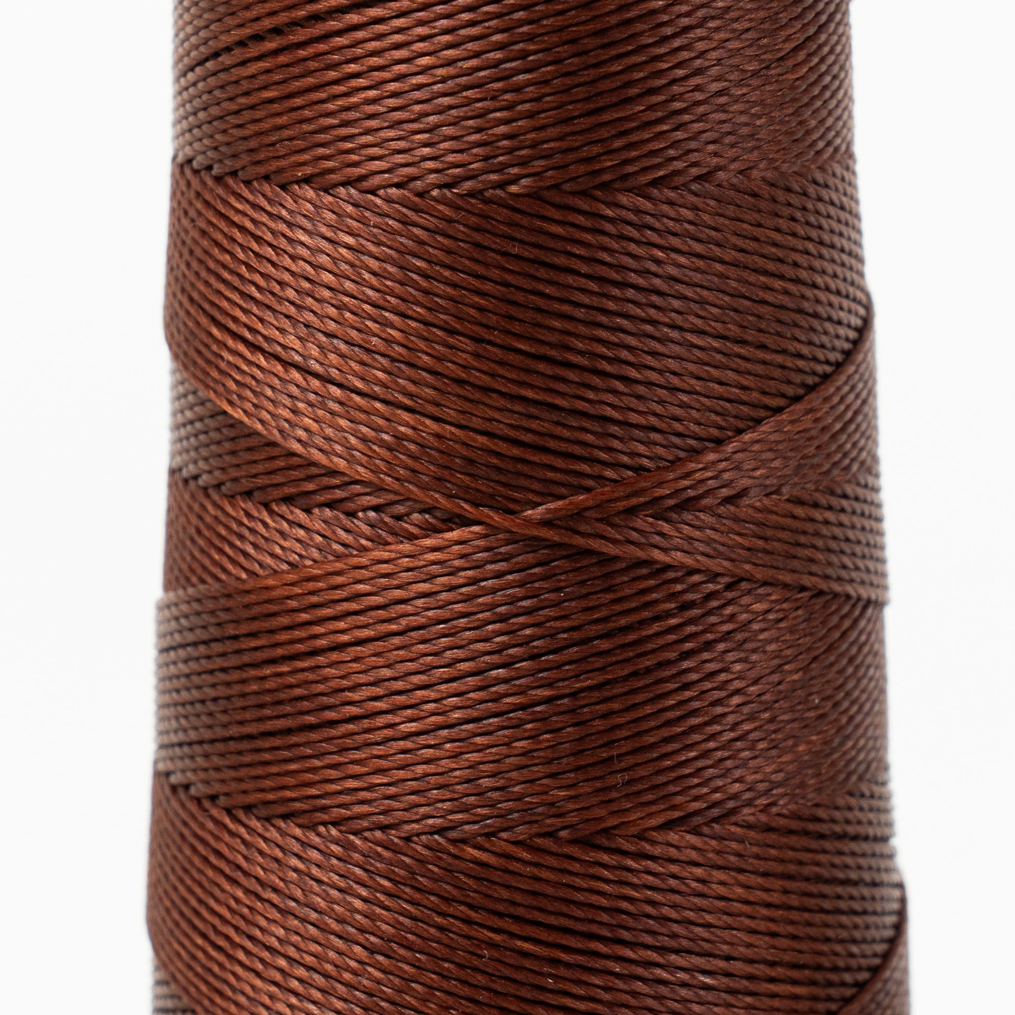 Close-up of MBT russet waxed polyester thread