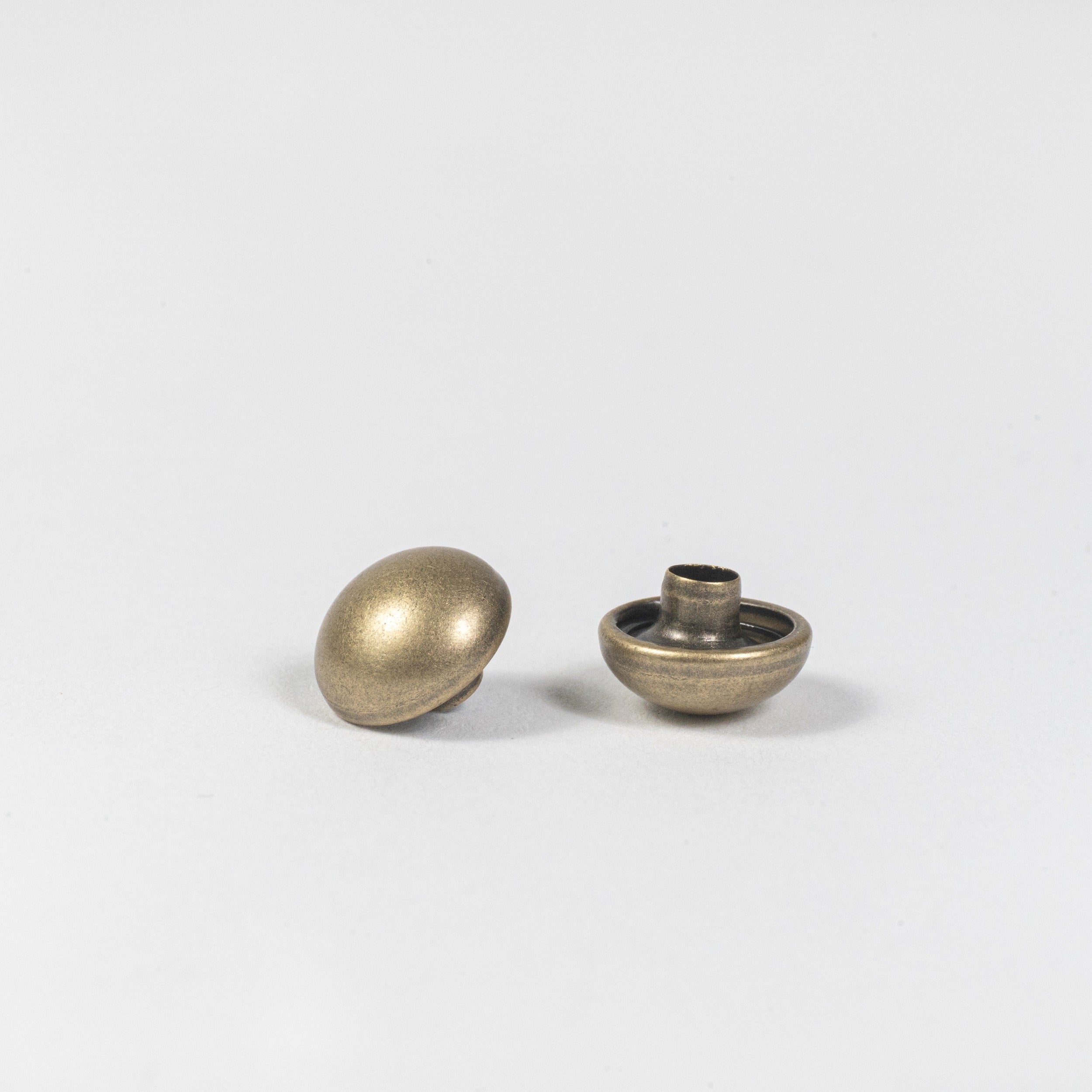antique brass domed rivet cap front view
