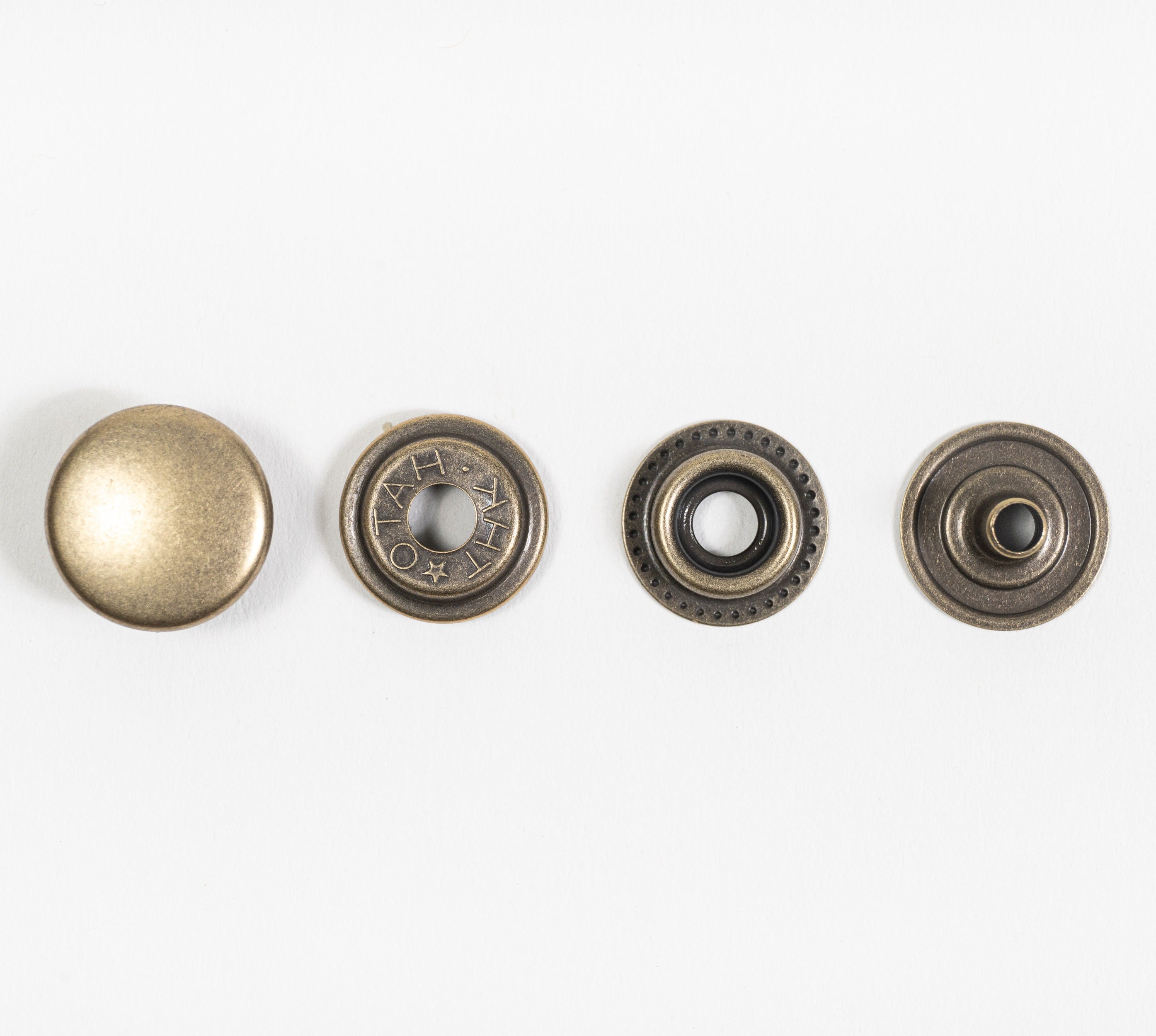 antique brass line snap full set front view