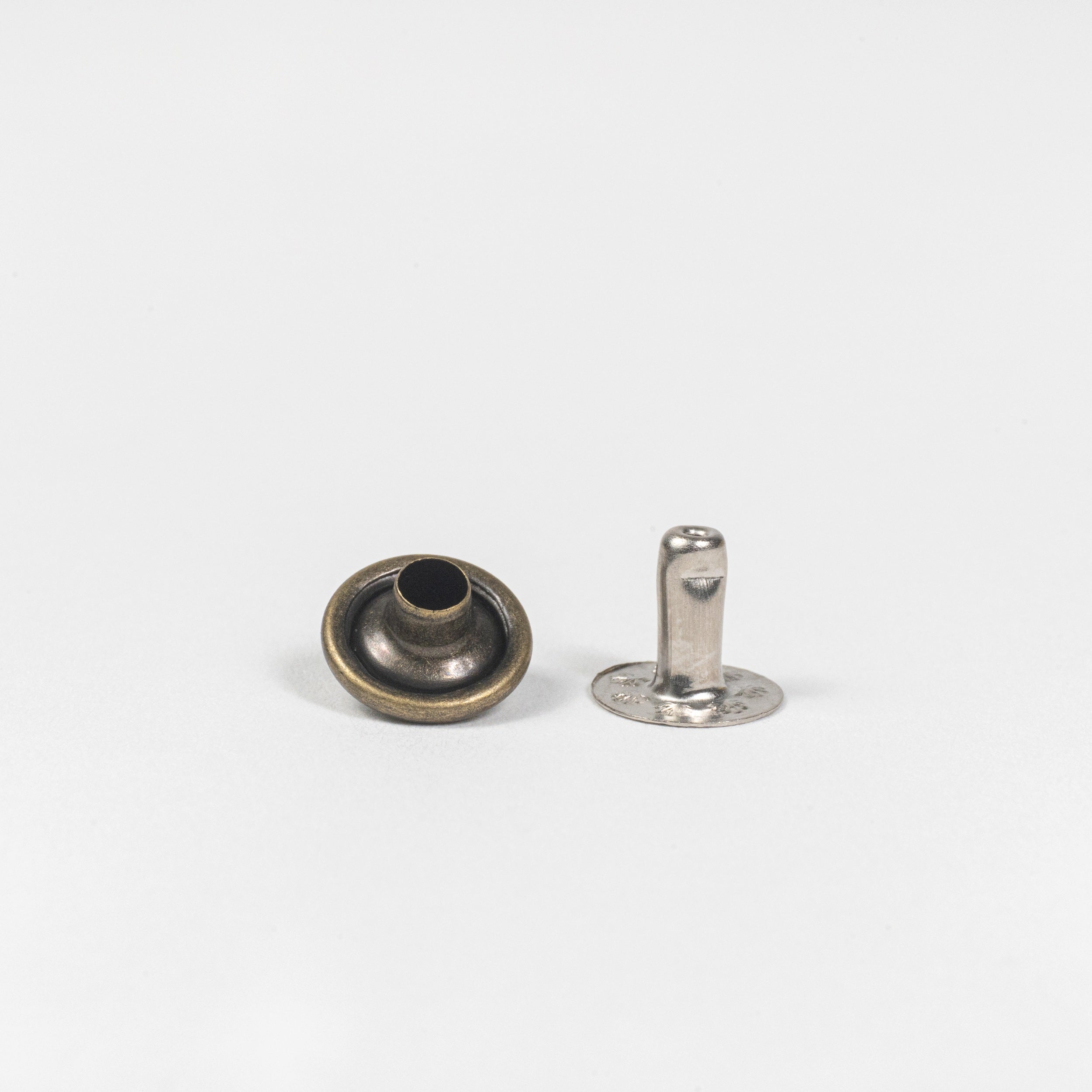 antique brass spike rivet front view