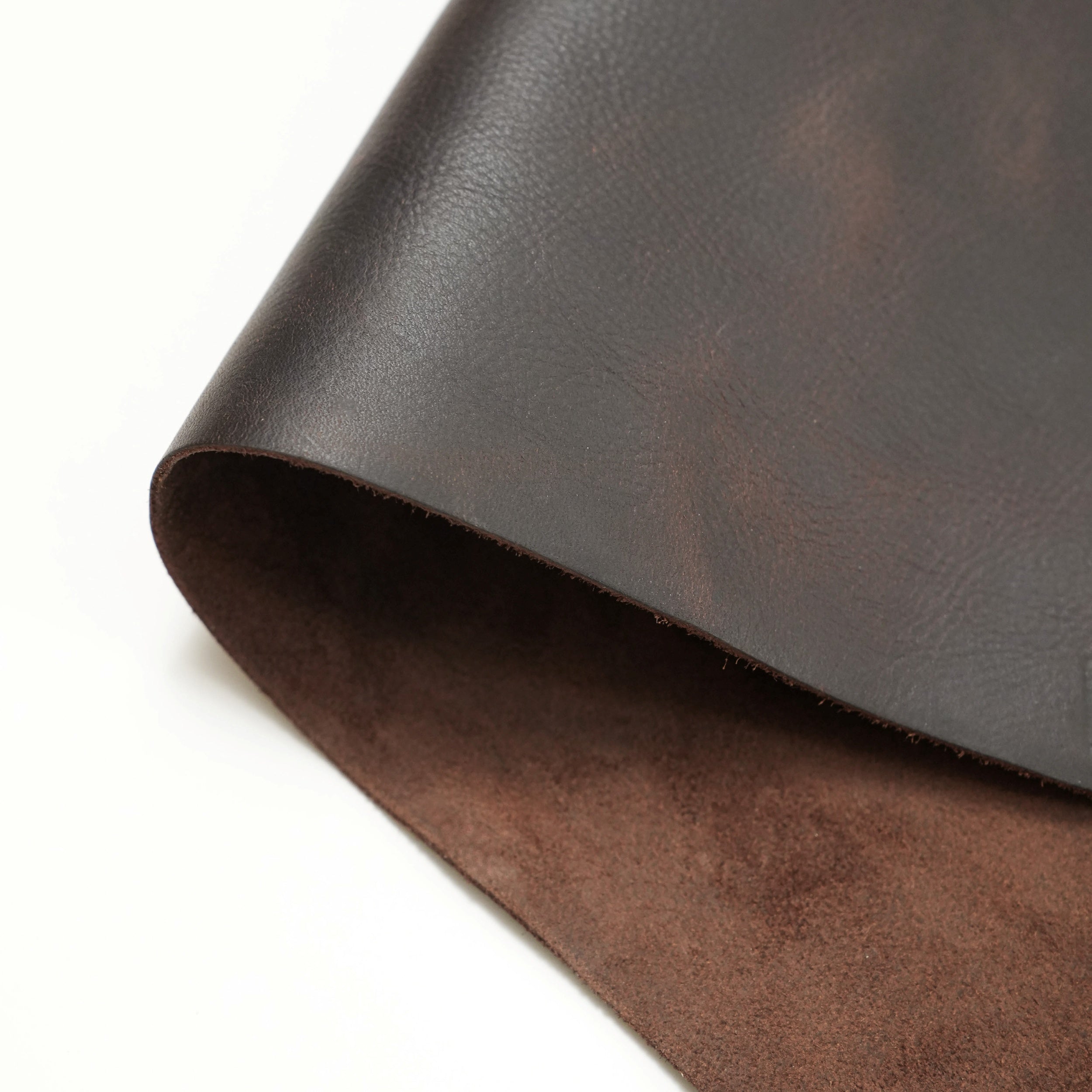 brown full grain pull up leather close up view