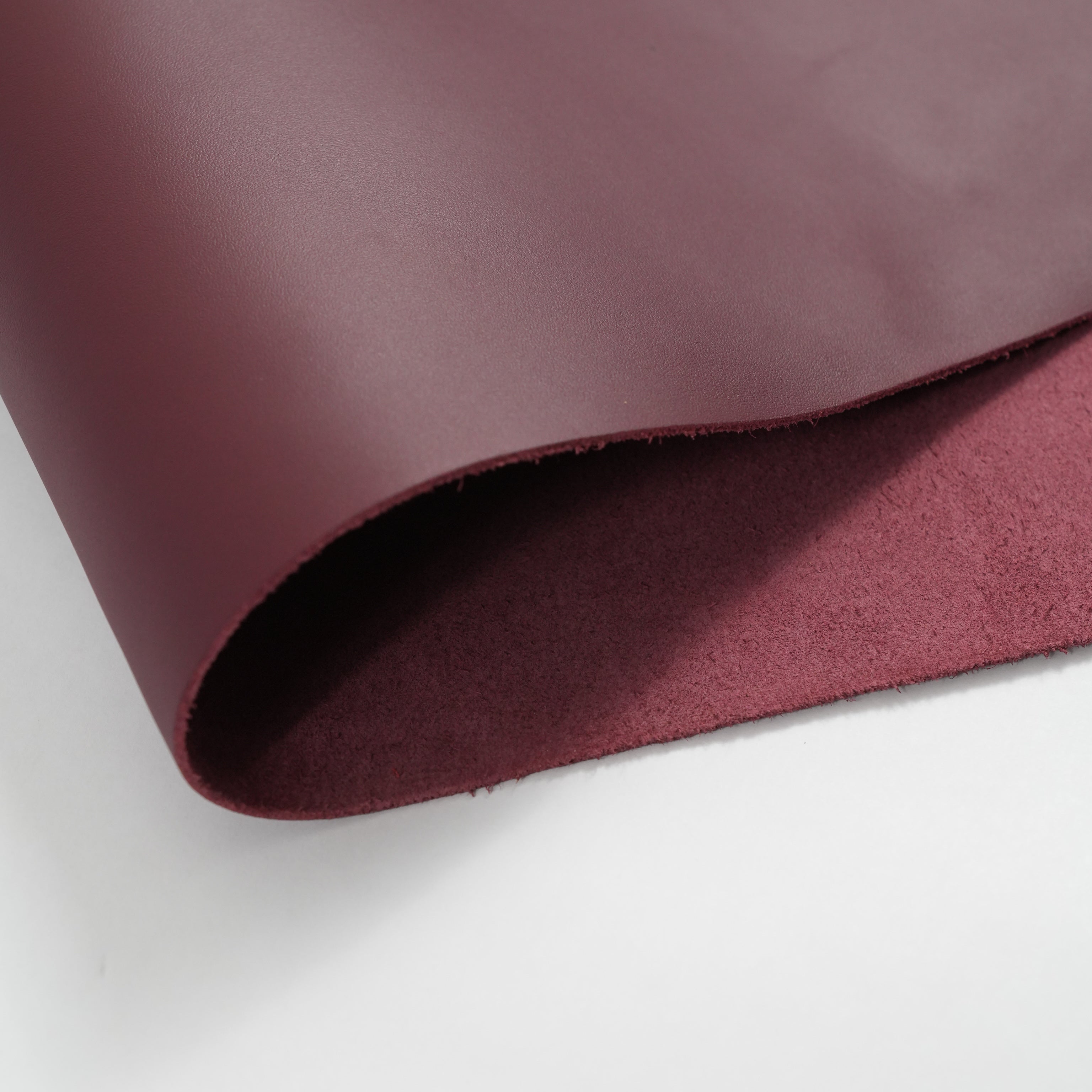 burgundy top-grain premium italian leather close-up view