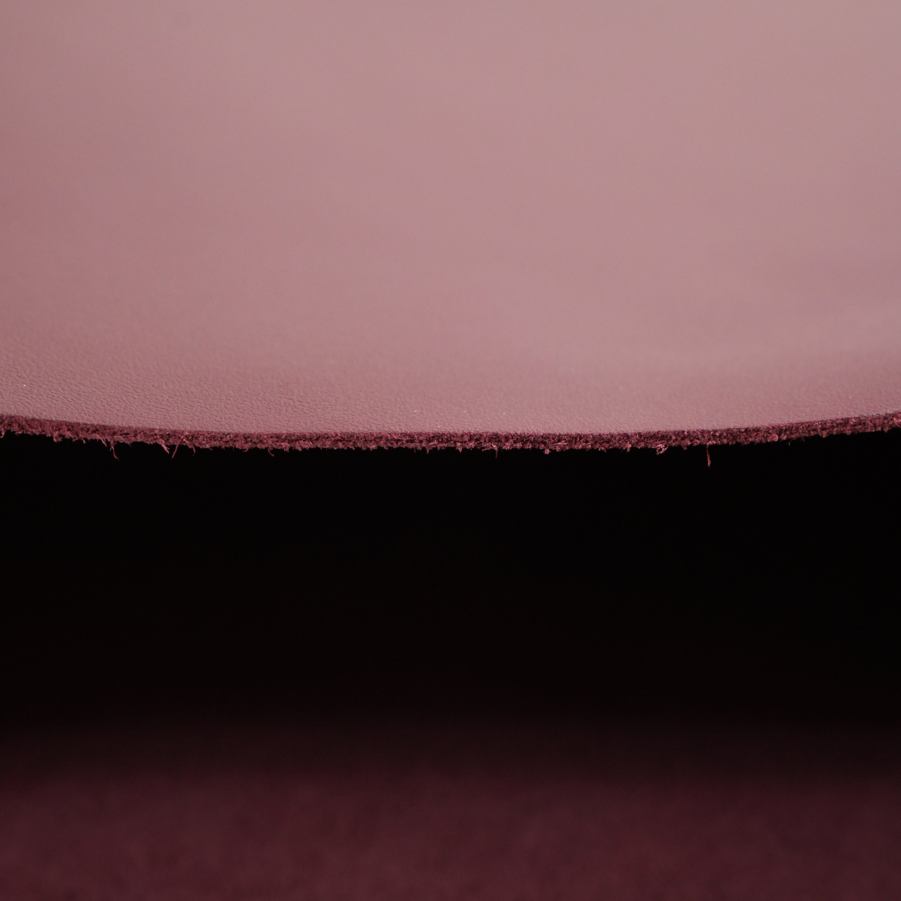 burgundy top-grain premium italian leather edge close-up view