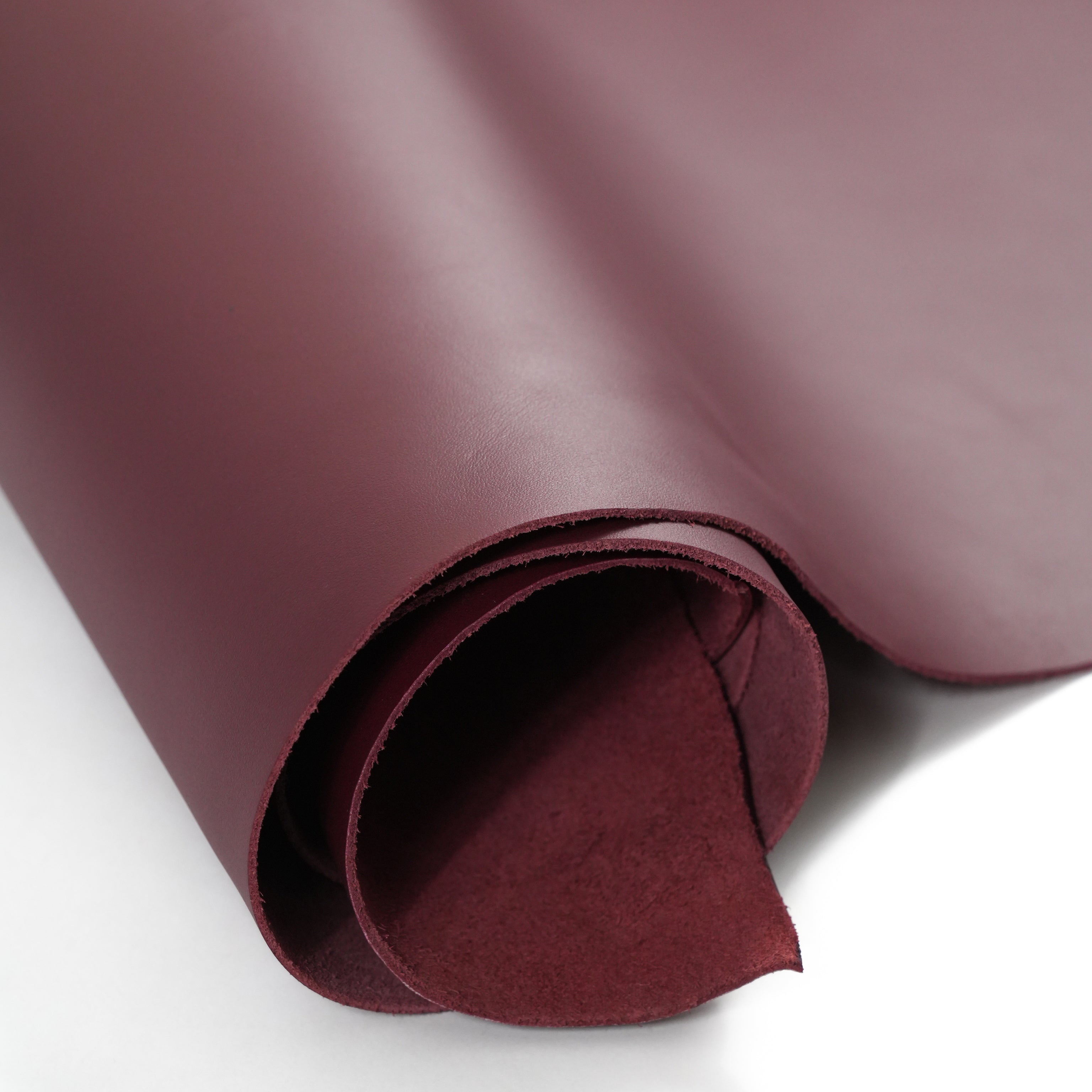 burgundy top-grain premium italian leather partially unrolled view