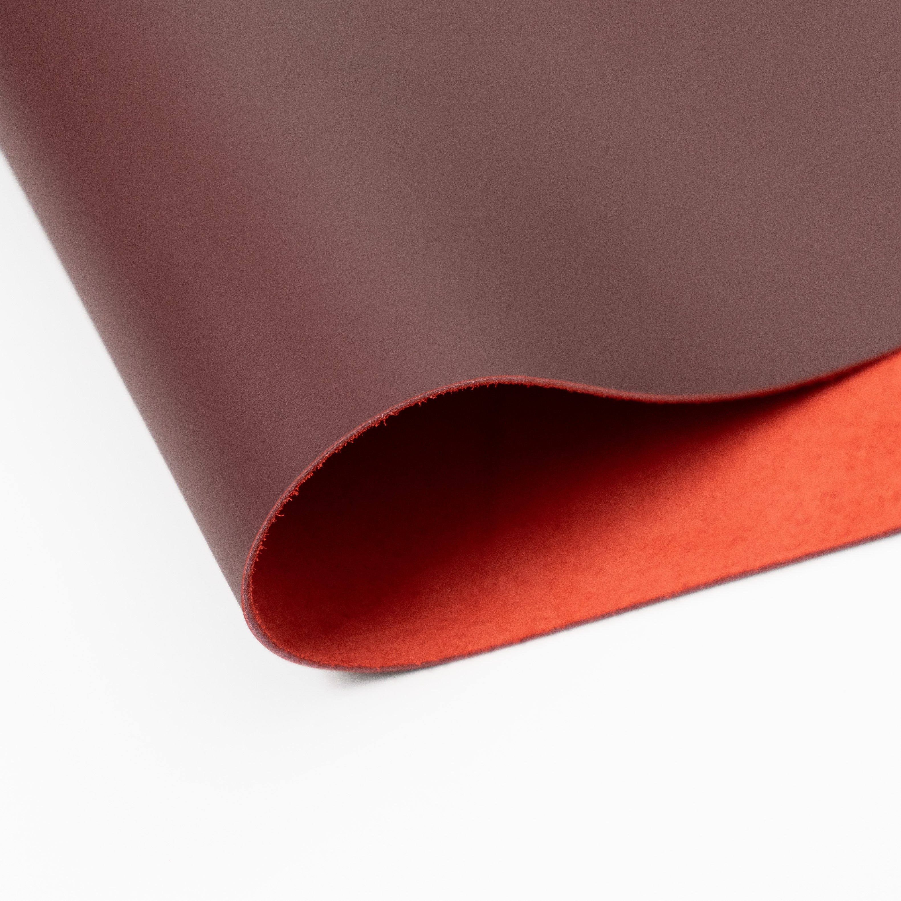 burgundy top grain premium italian leather with red backside close-up texture