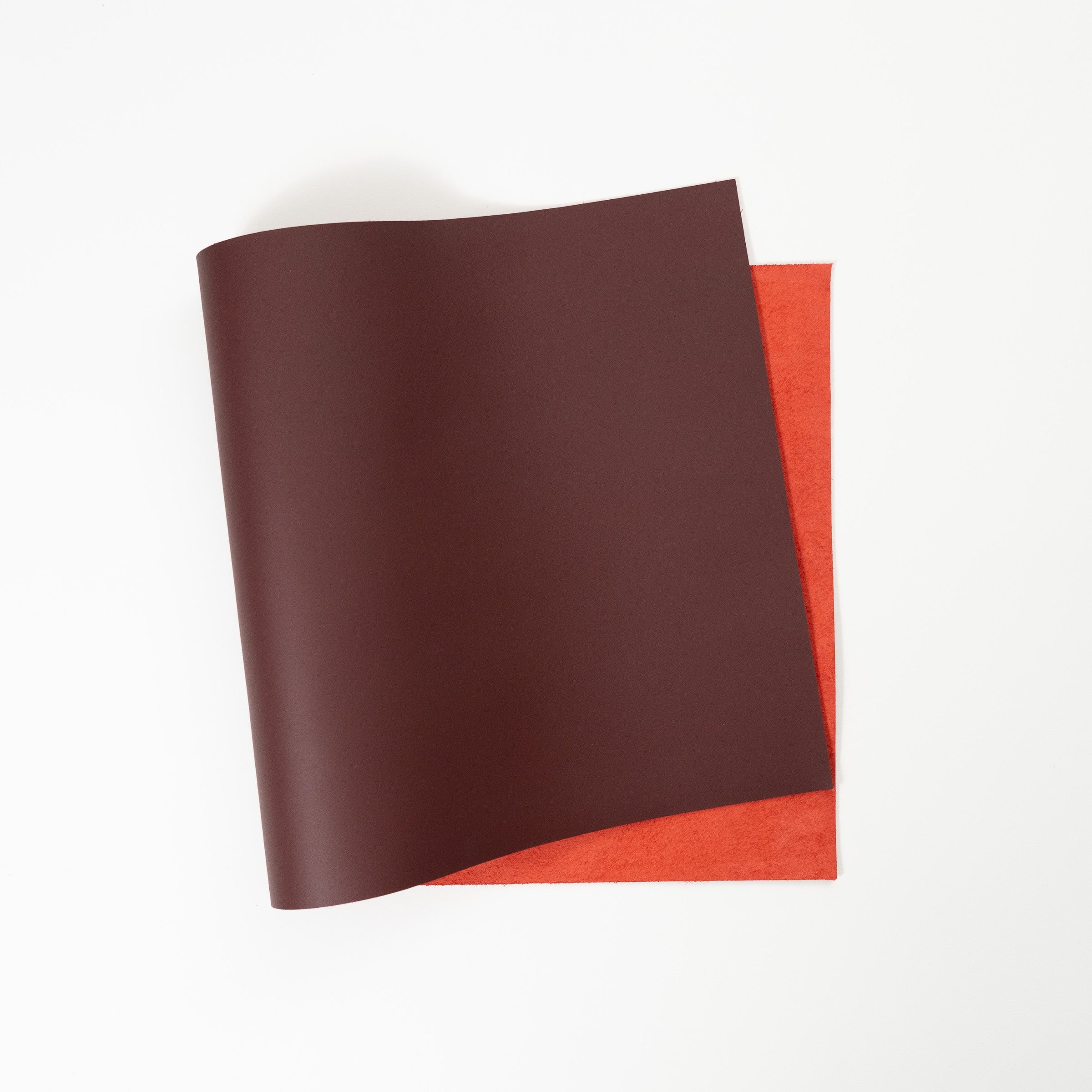 burgundy top grain premium italian leather with red backside top view