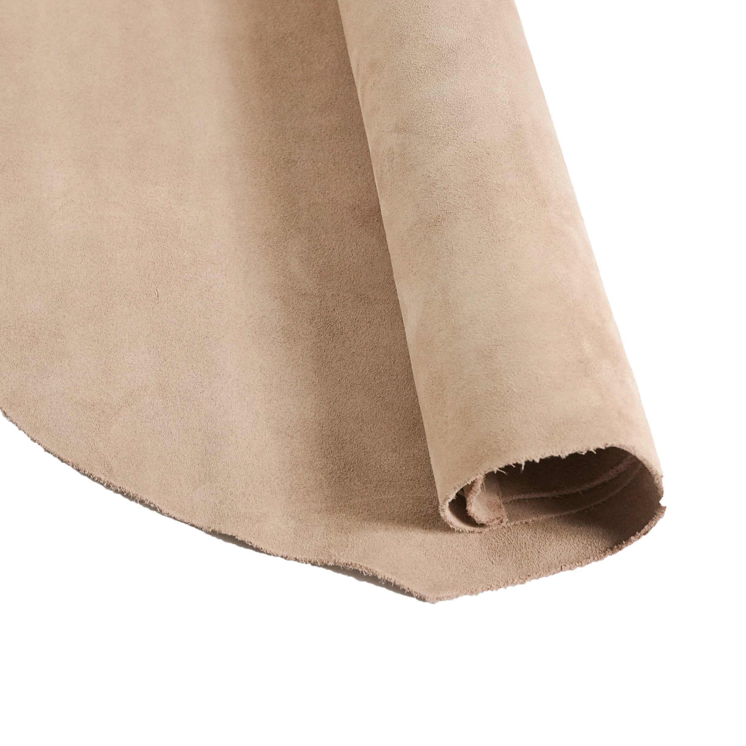 cowhide suede leather beige draped in natural light