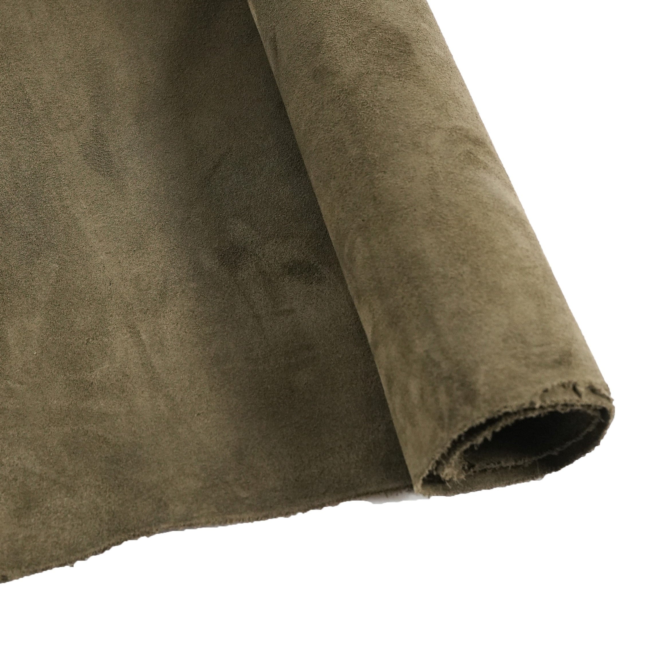 cowhide suede leather khaki green draped in natural light