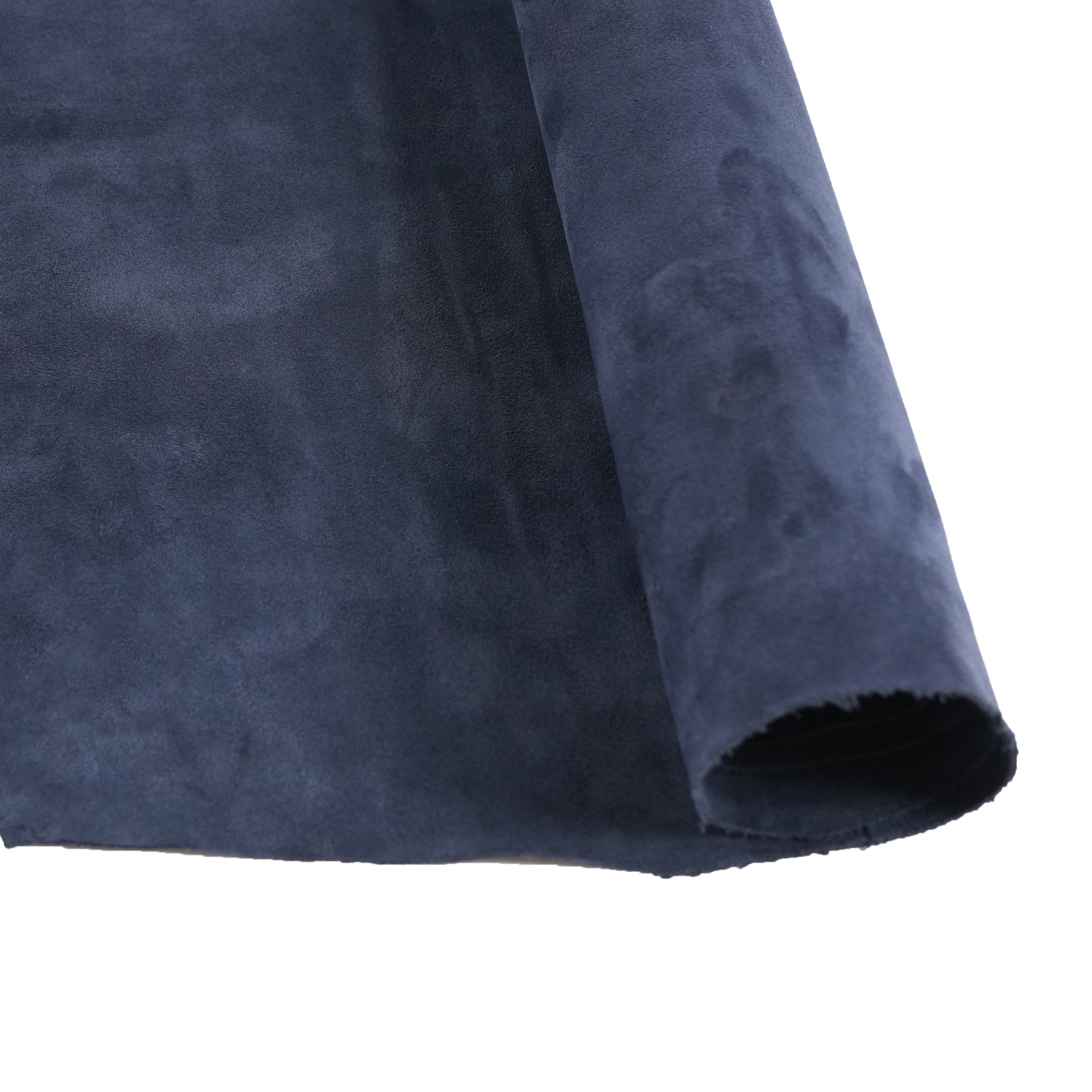 cowhide suede leather navy blue draped in natural light
