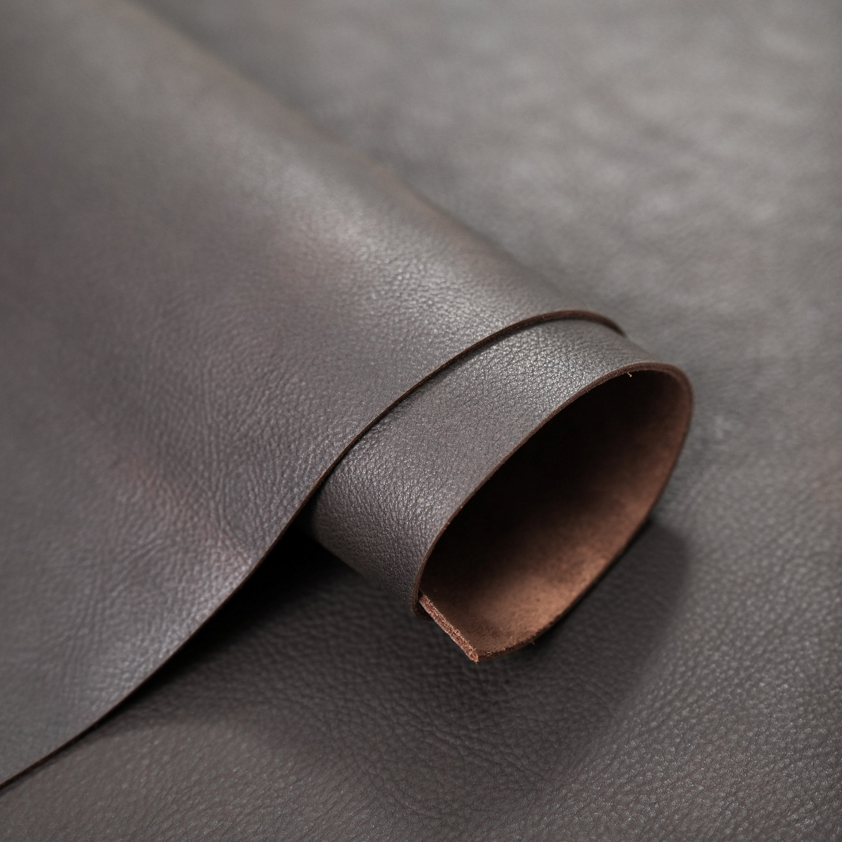 full grain pull up leather brown vintage distressed look rolled