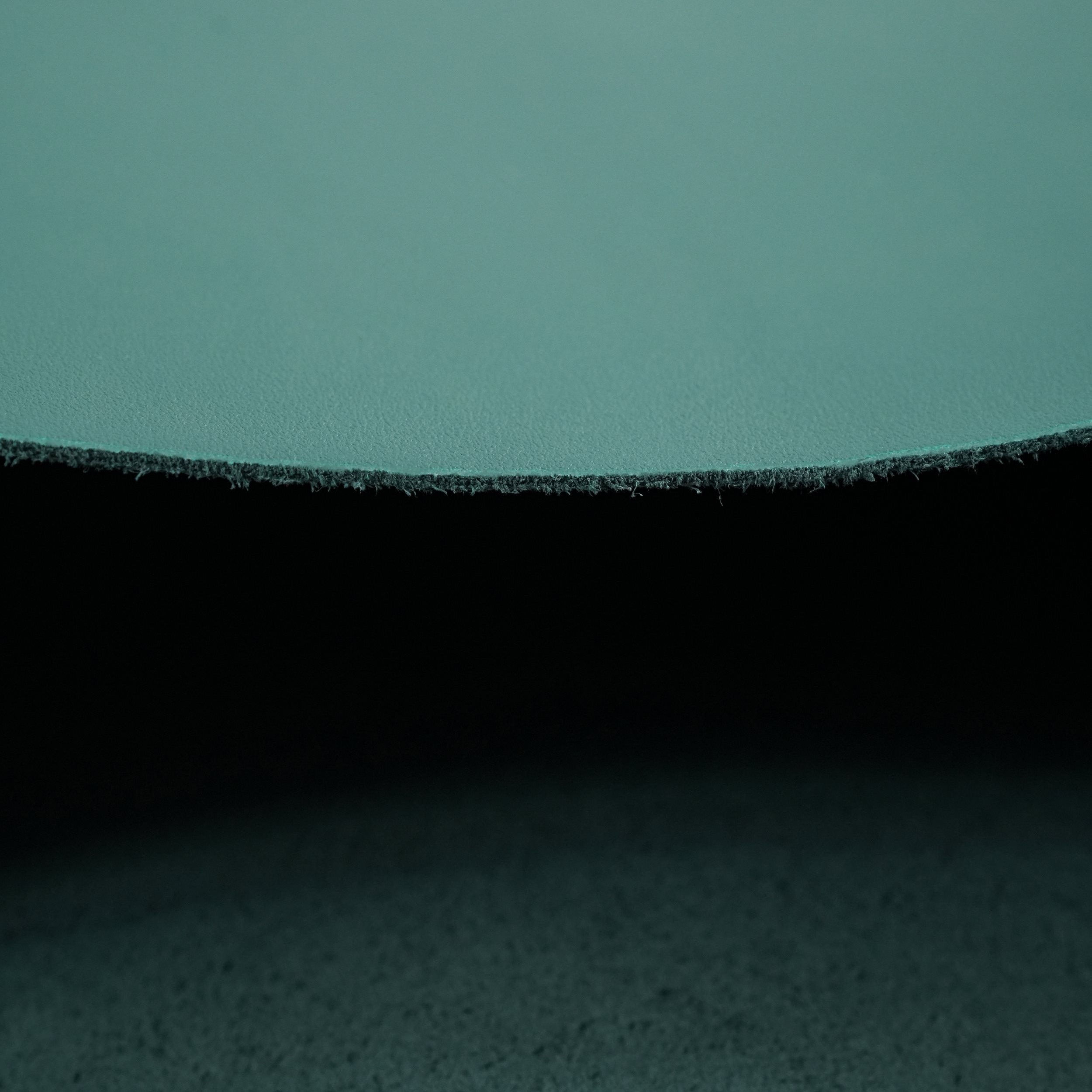 green top-grain premium italian leather edge close-up view