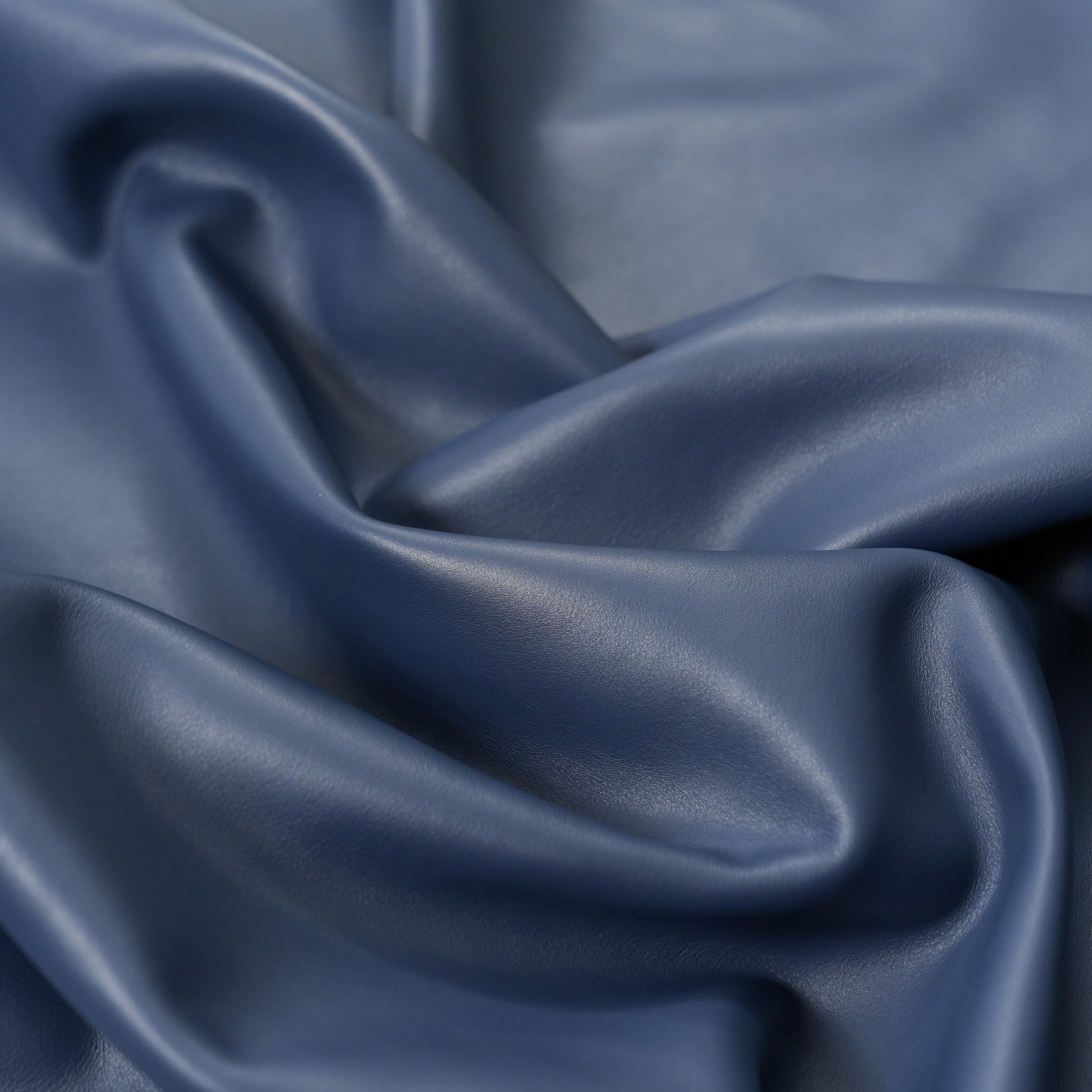 italian nappa calfskin leather surface detail navy blue color