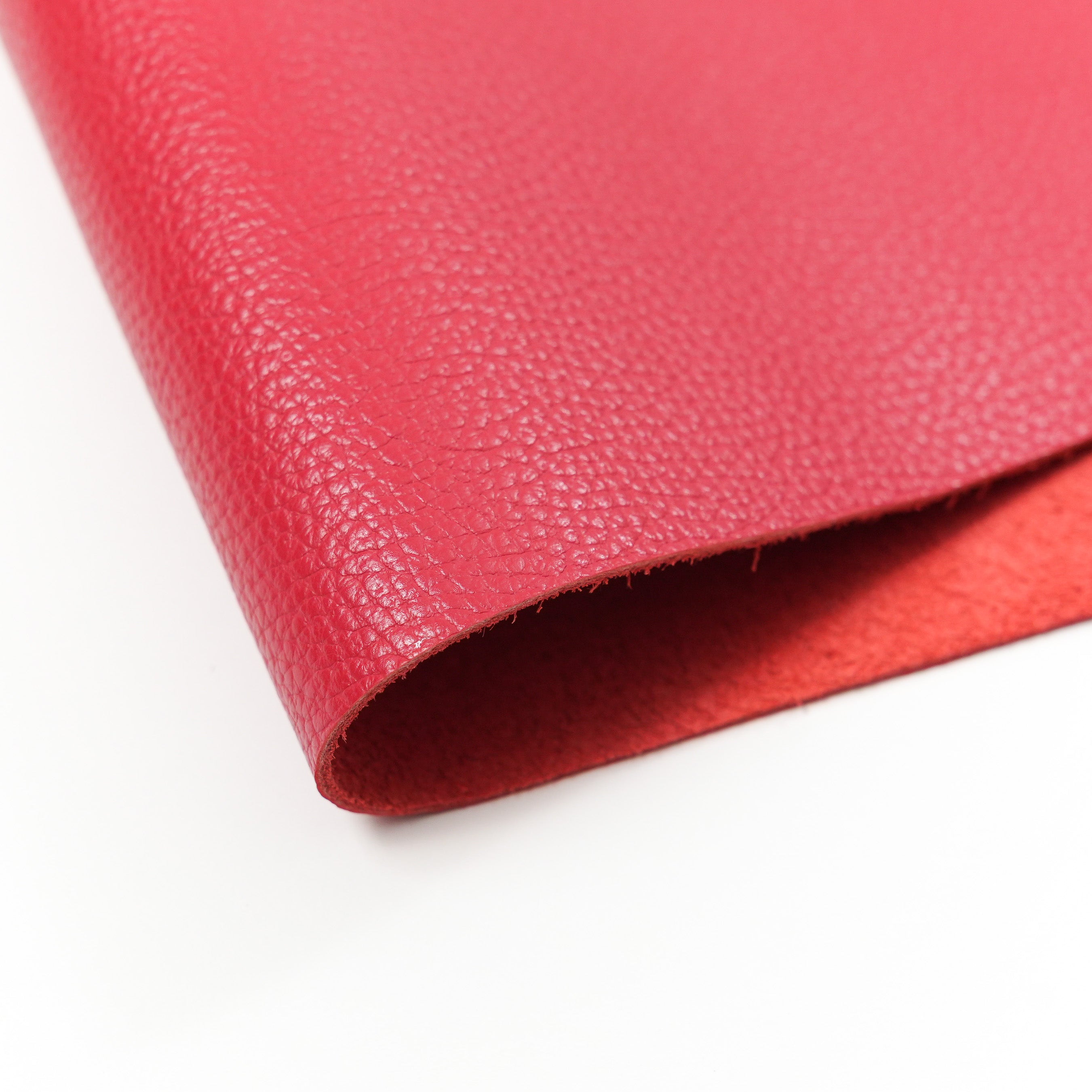 italian pebble grain cowhide leather pre cut sheet red close up