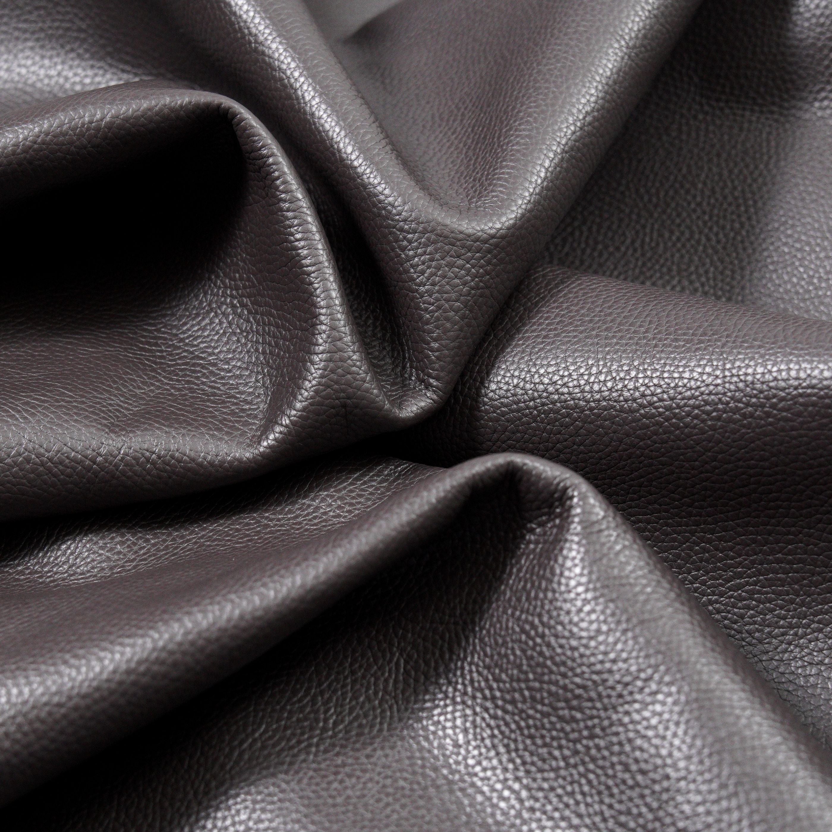 italian pebble grain cowhide leather surface detail brown close up