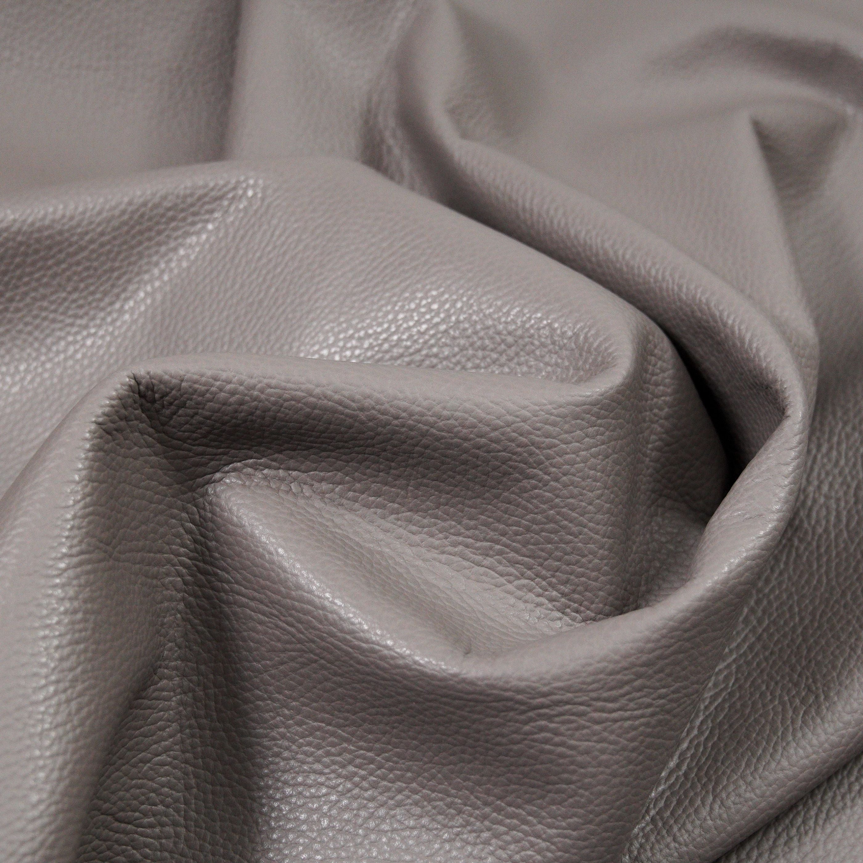 italian pebble grain cowhide leather surface detail gray close up