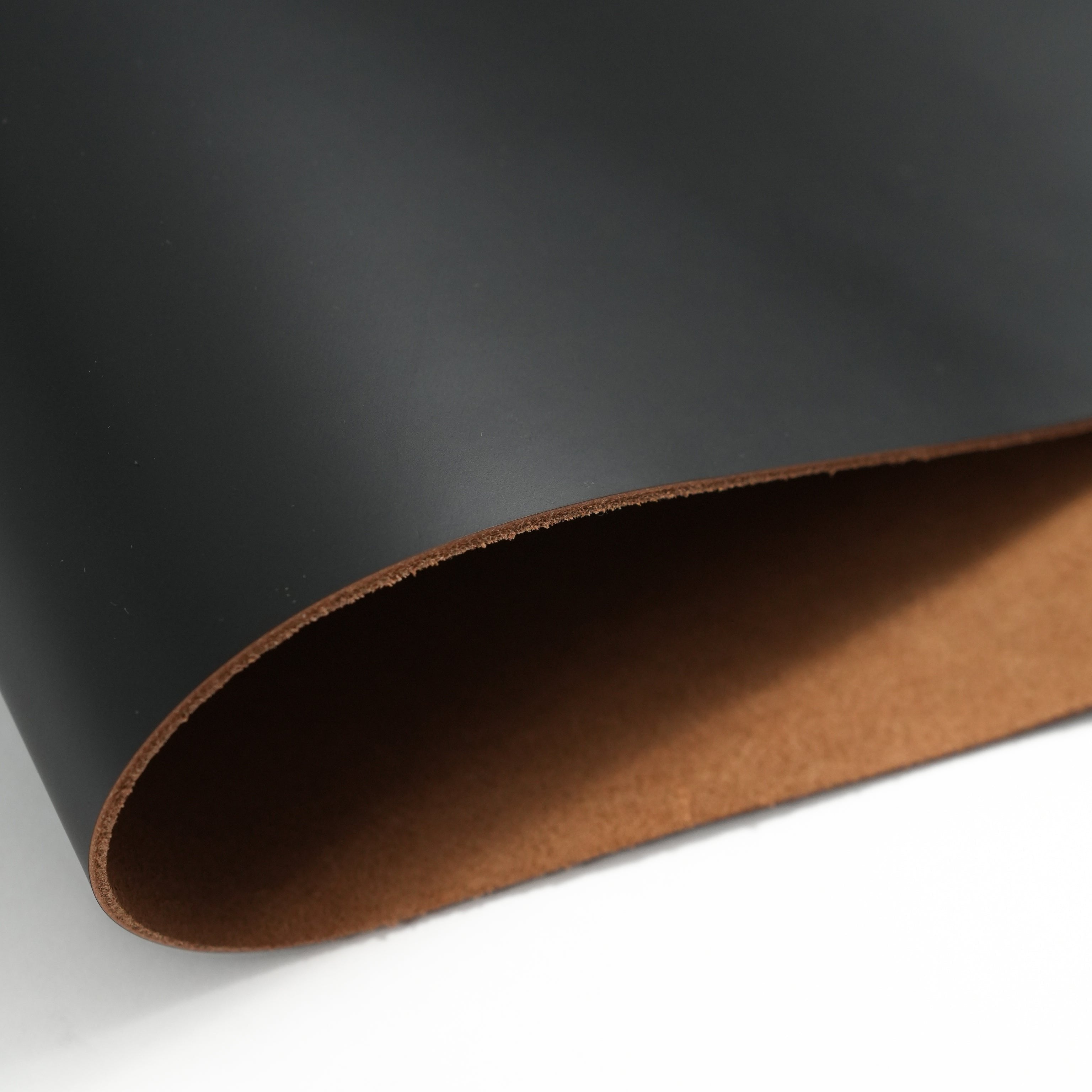 close-up of italian smooth leather sides black