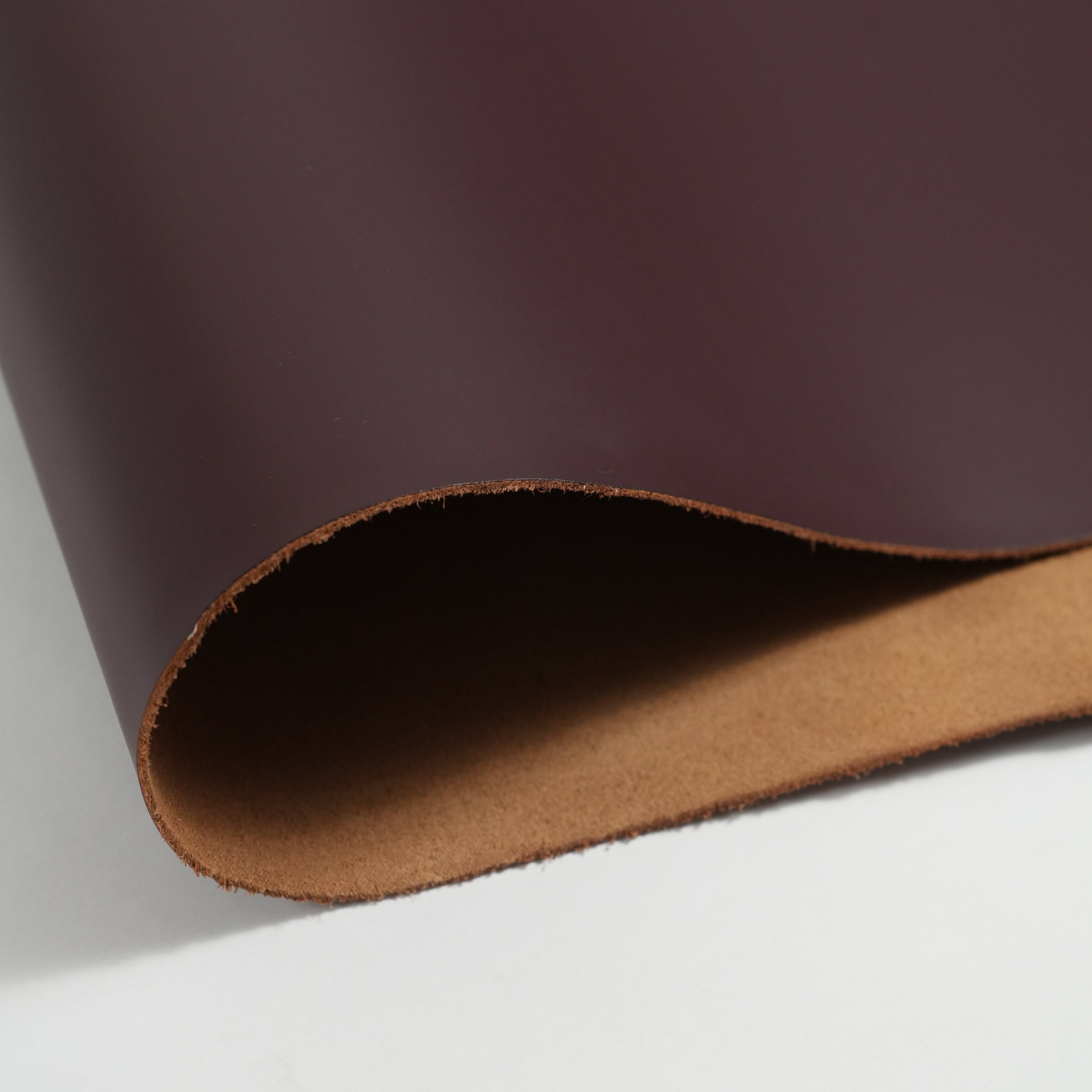 italian smooth leather sides burgundy close-up texture