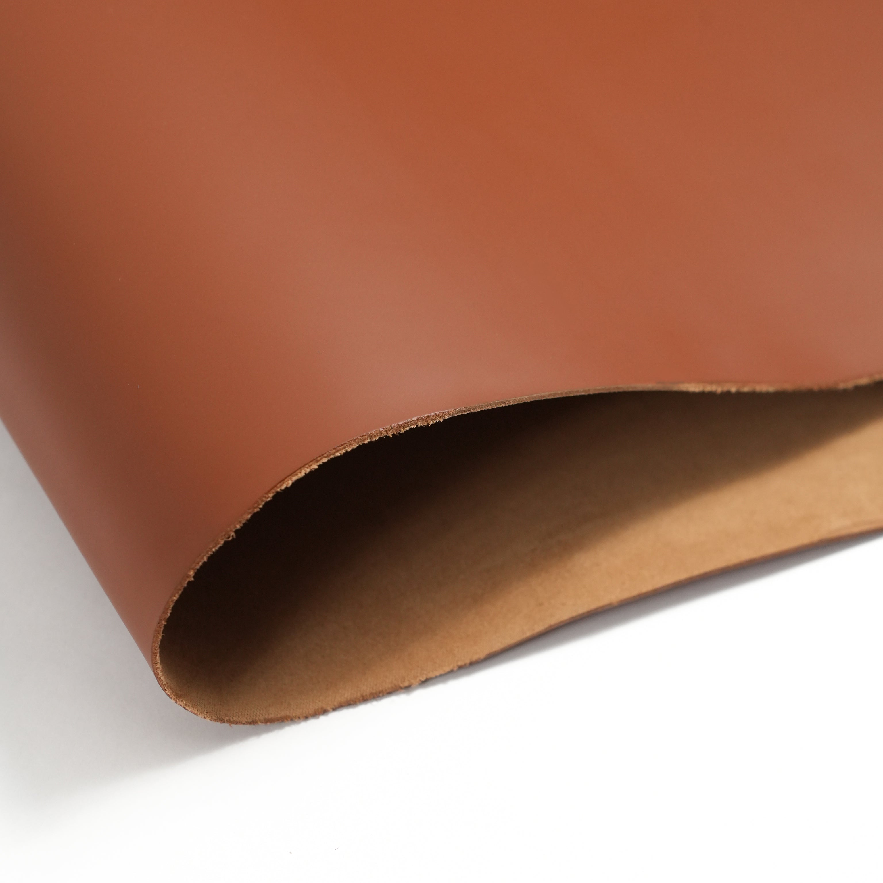 italian smooth leather sides cognac brown folded sheet edge detail