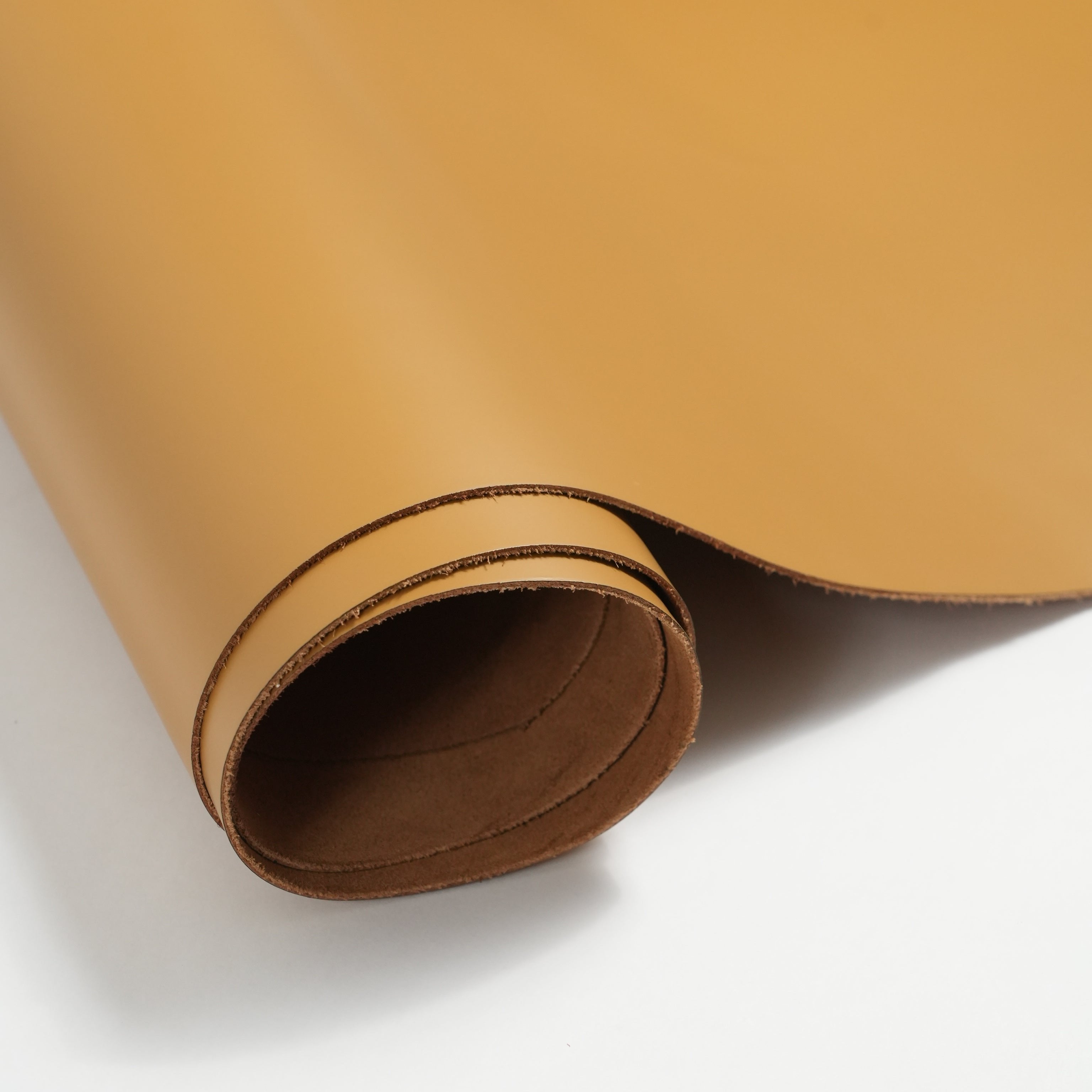 italian smooth leather sides mustard yellow close-up flat lay texture