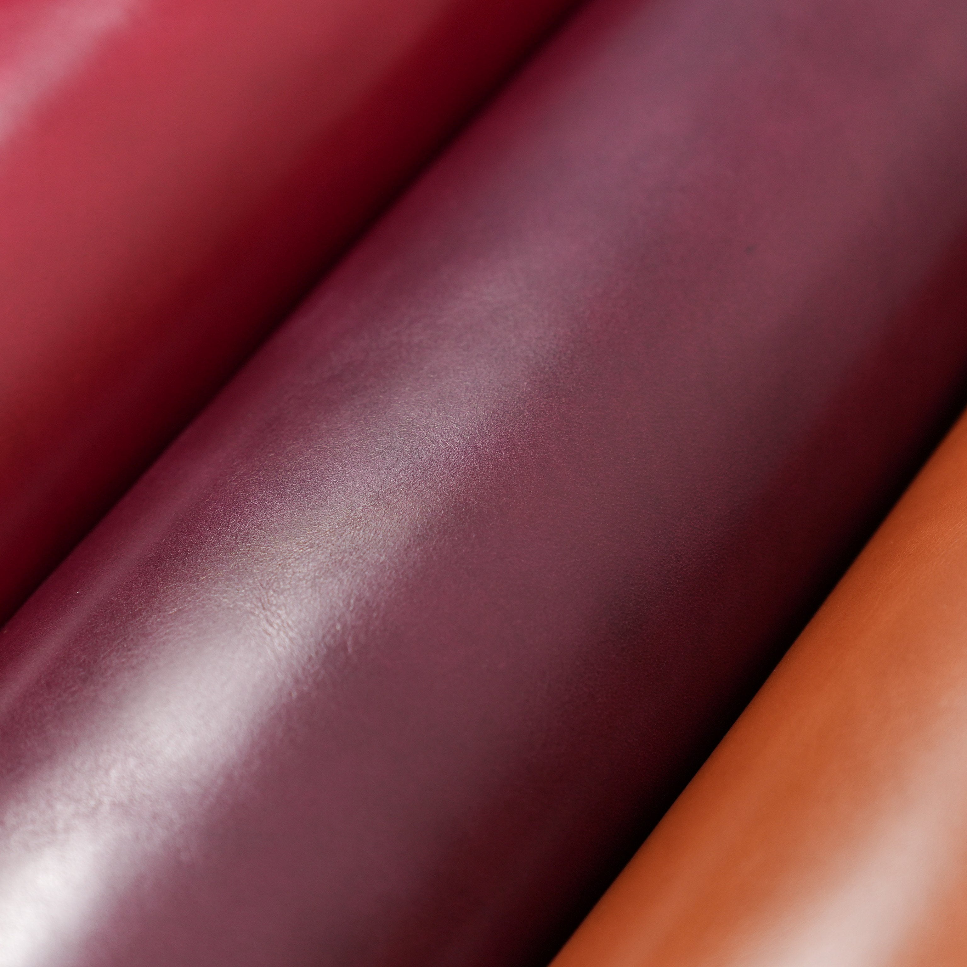 italian top grain glazed leather close up burgundy