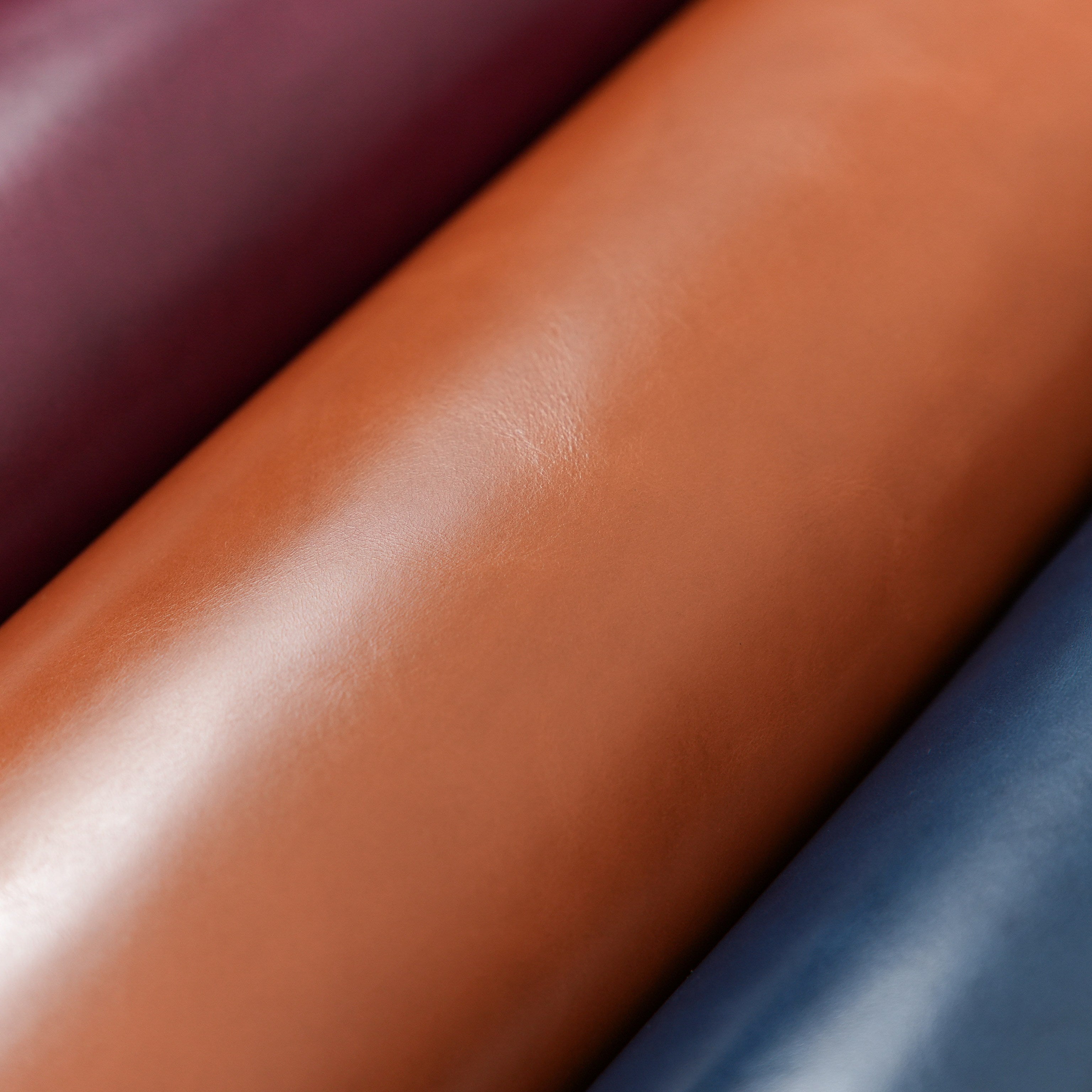 italian top grain glazed leather close up cognac brown