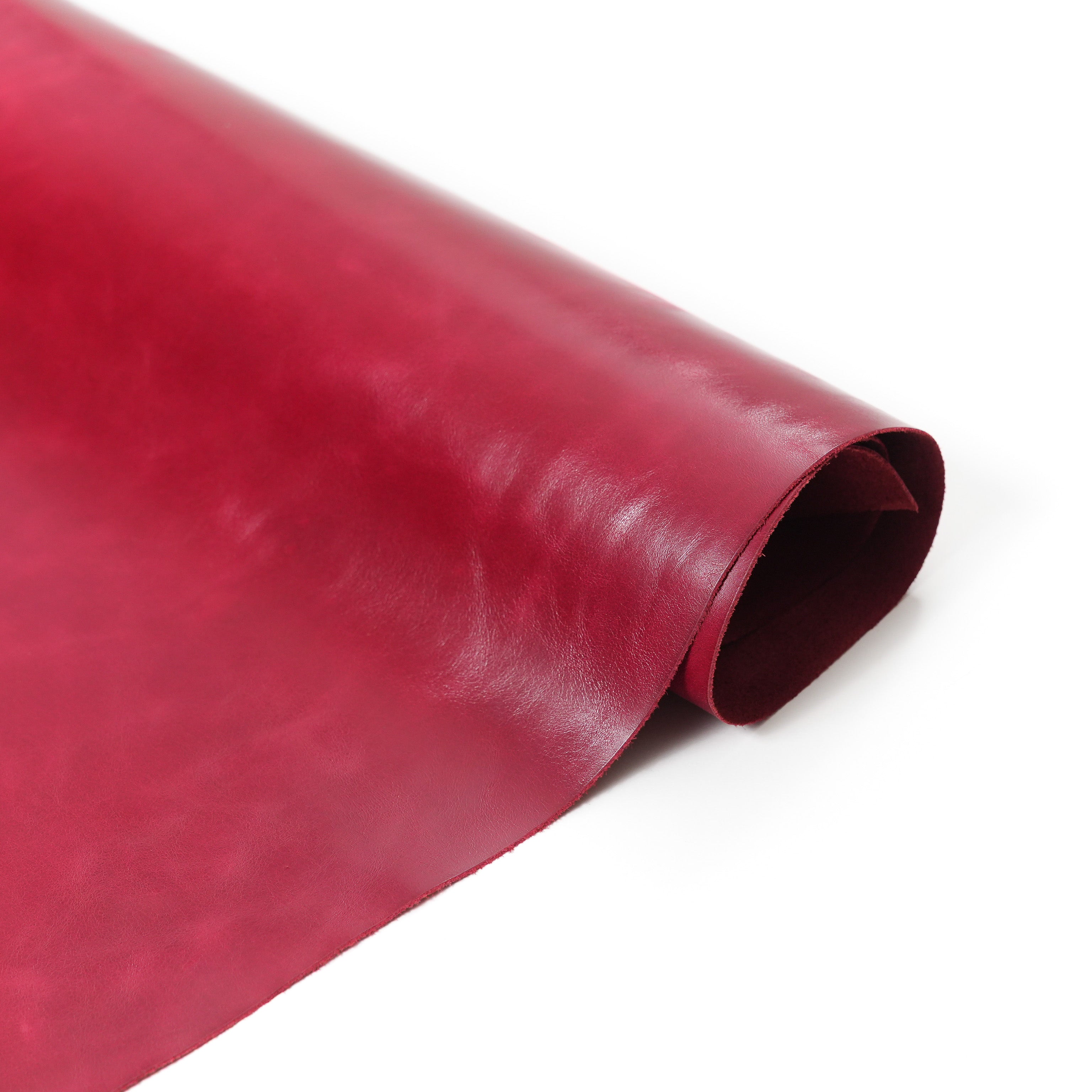 italian top grain glazed leather close up hide red