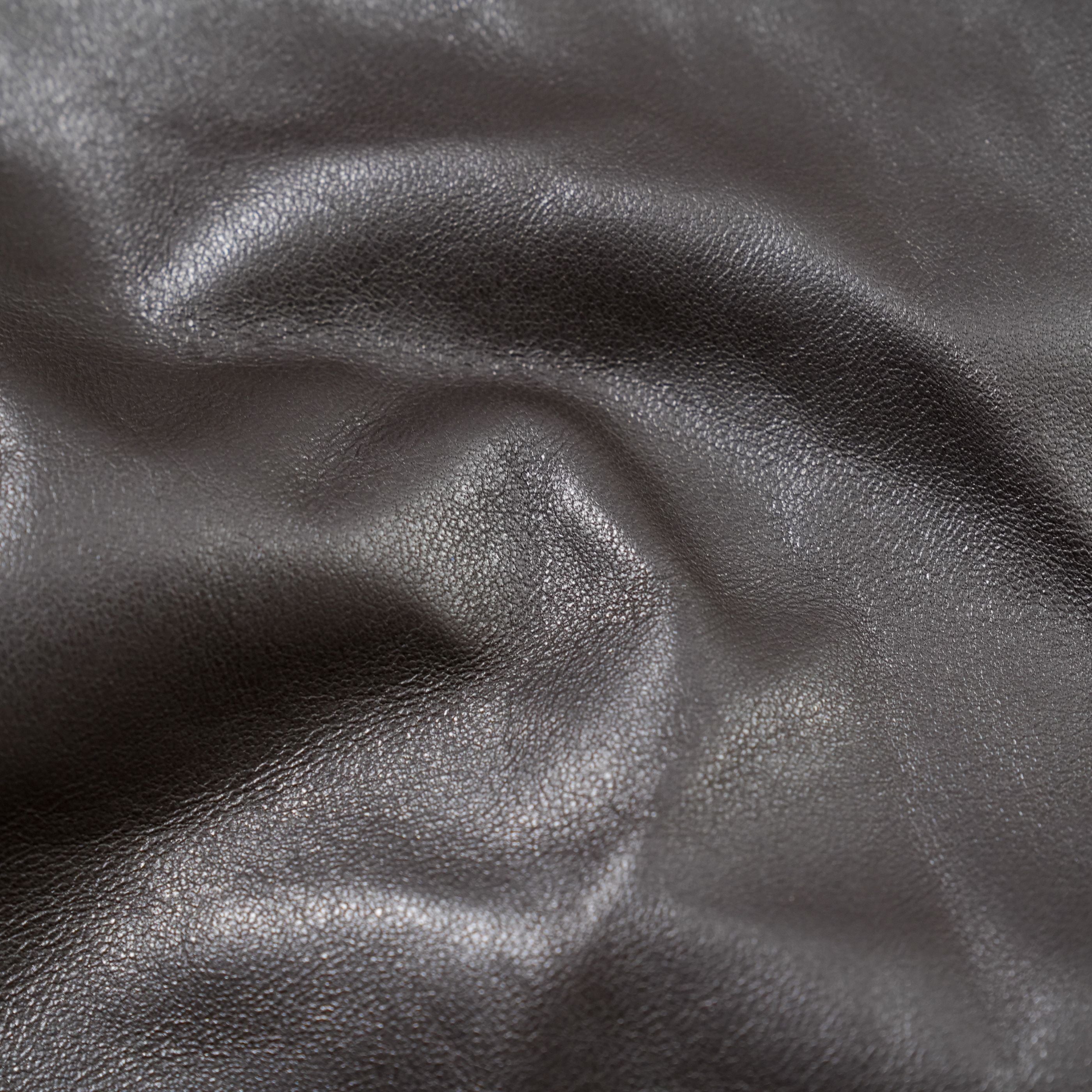 lambskin garment leather plonge dark brown close up view