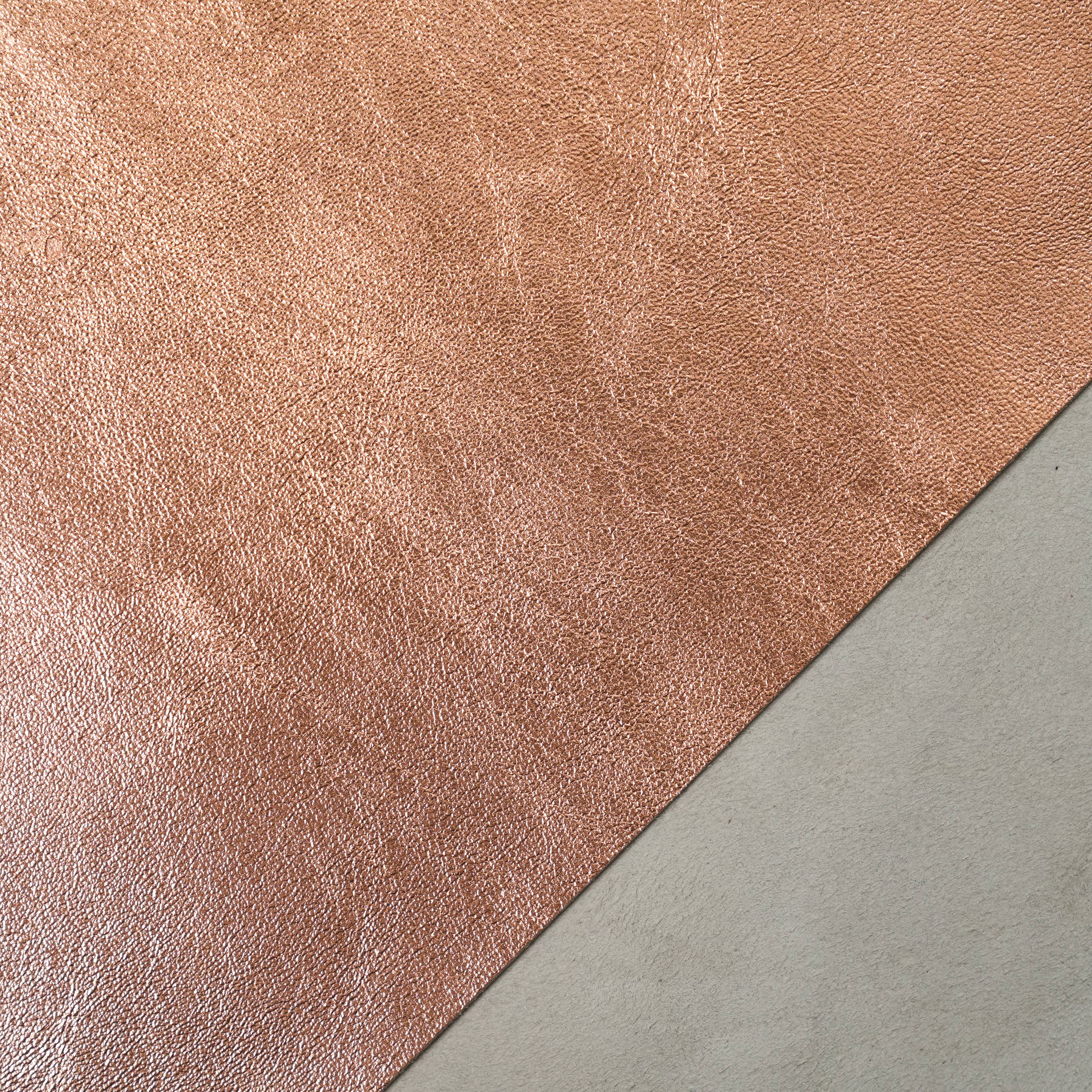 metallic leather close up rose gold color