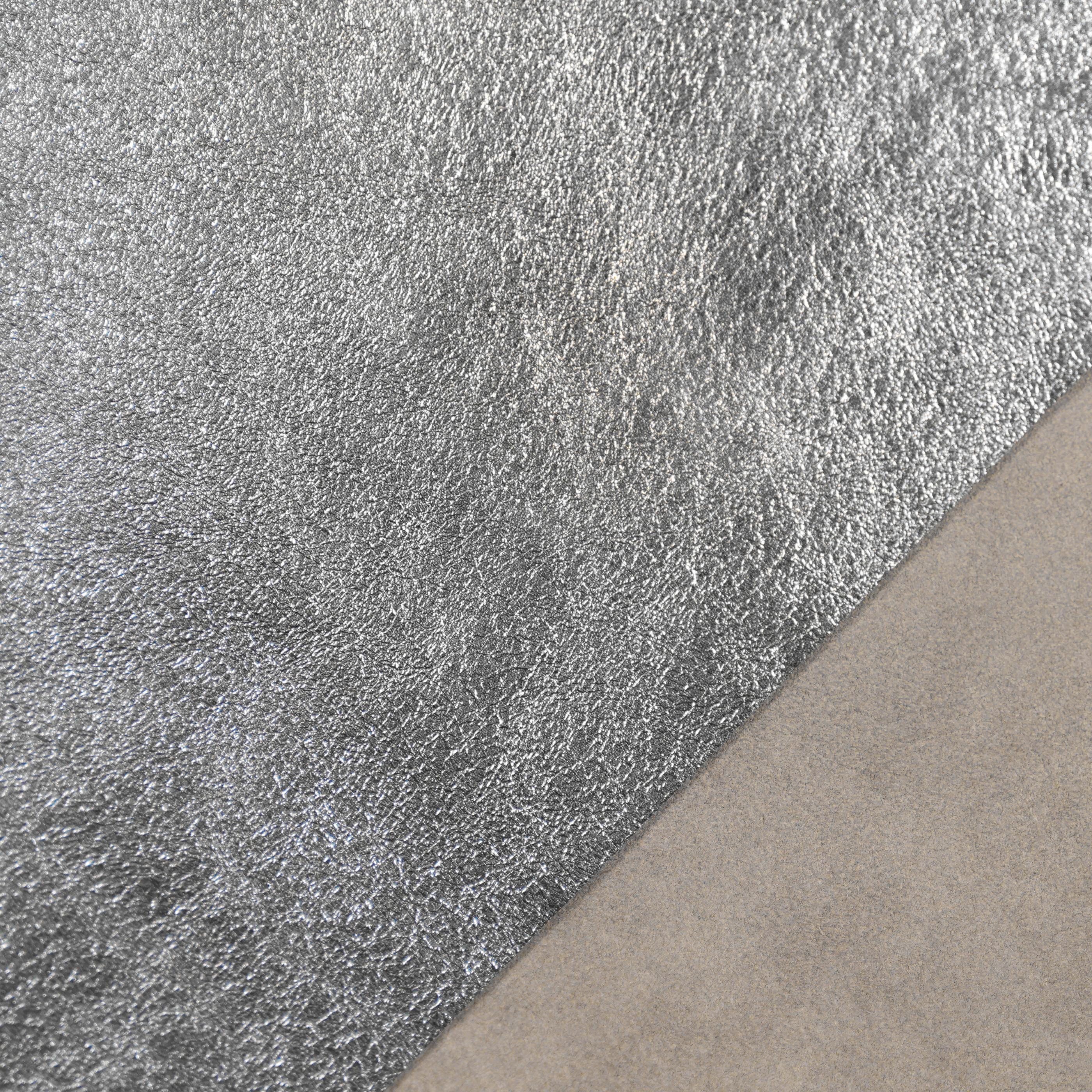 metallic leather close up silver color
