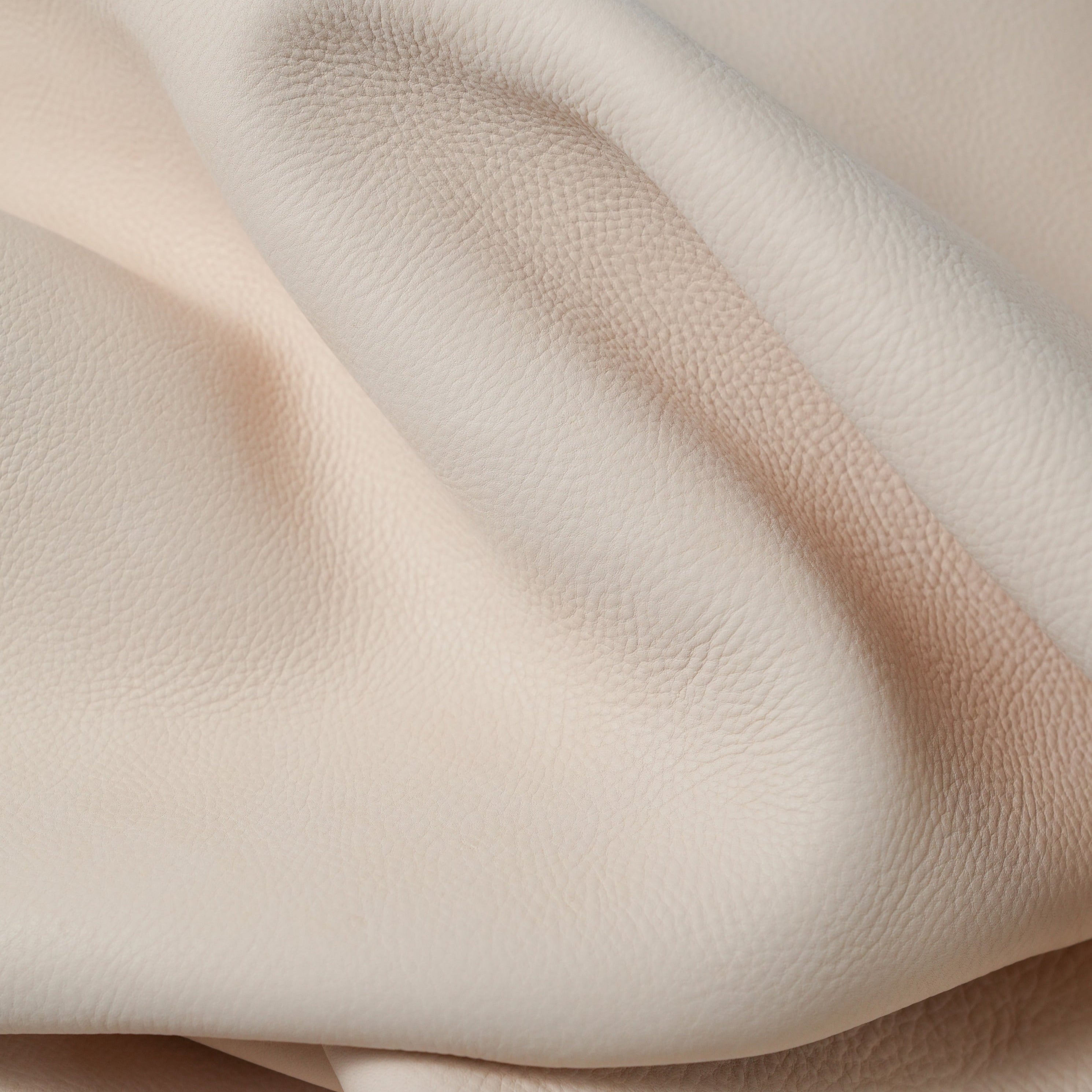 Milled natural vegetable tanned leather