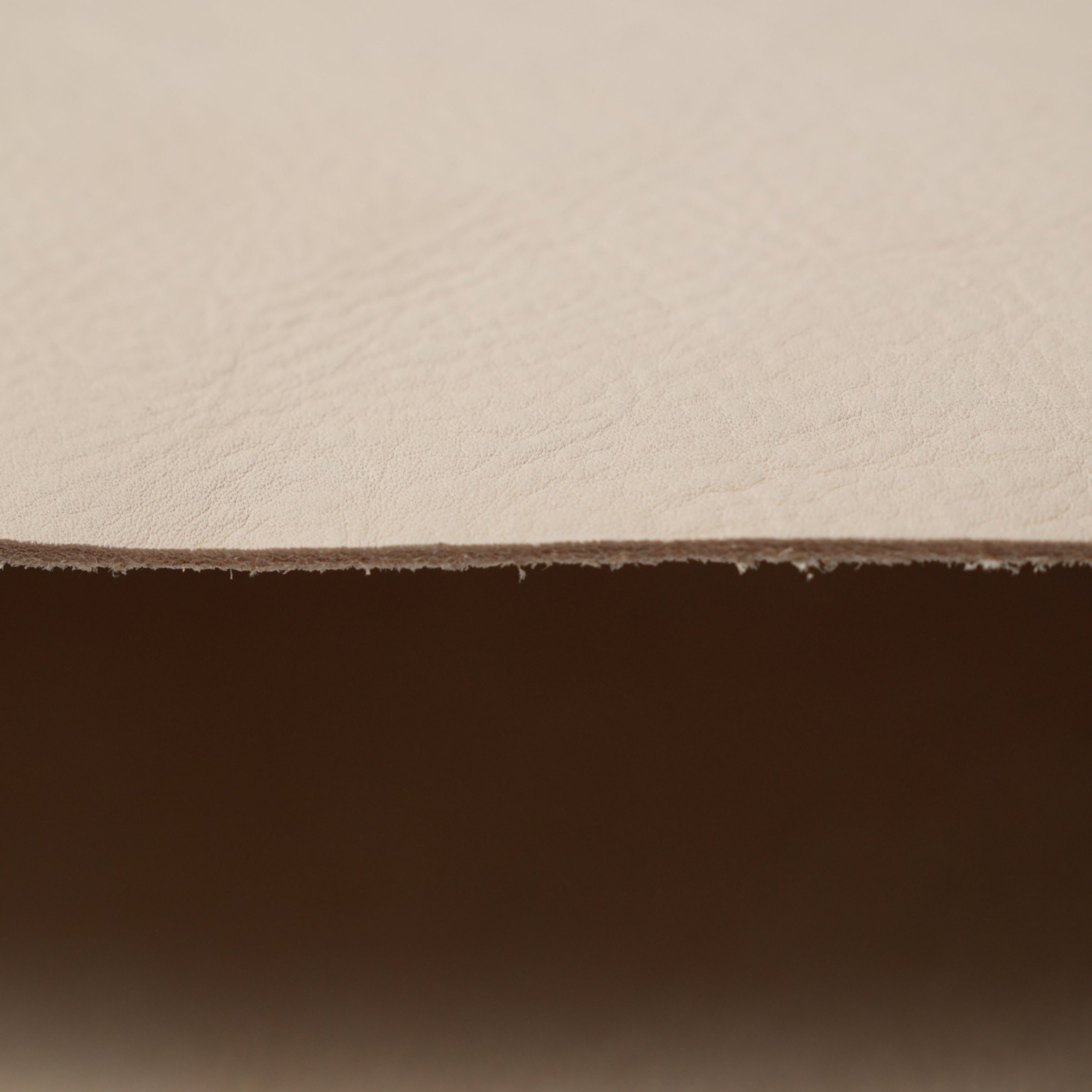Detailed view of milled veg tan leather sides