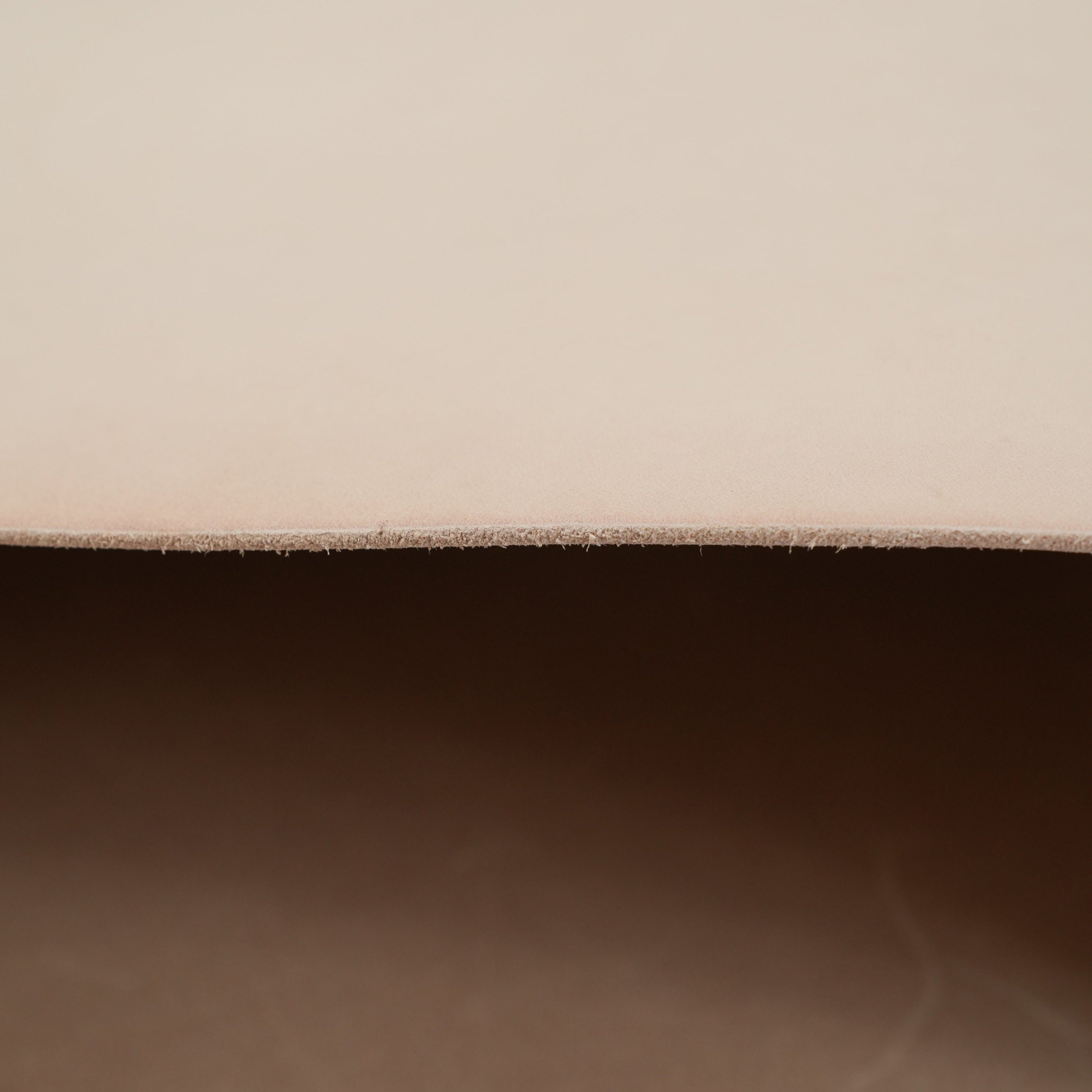 Full view of natural vegetable tanned veg tan leather sides