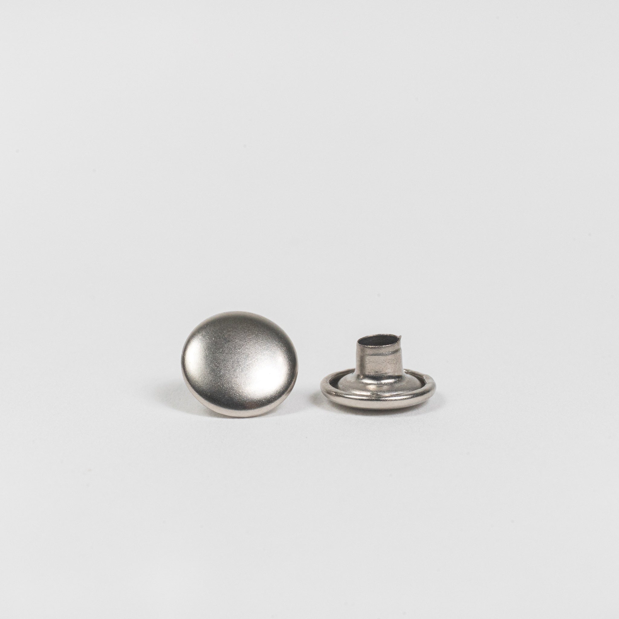 nickel plated double cap rivets top and base view