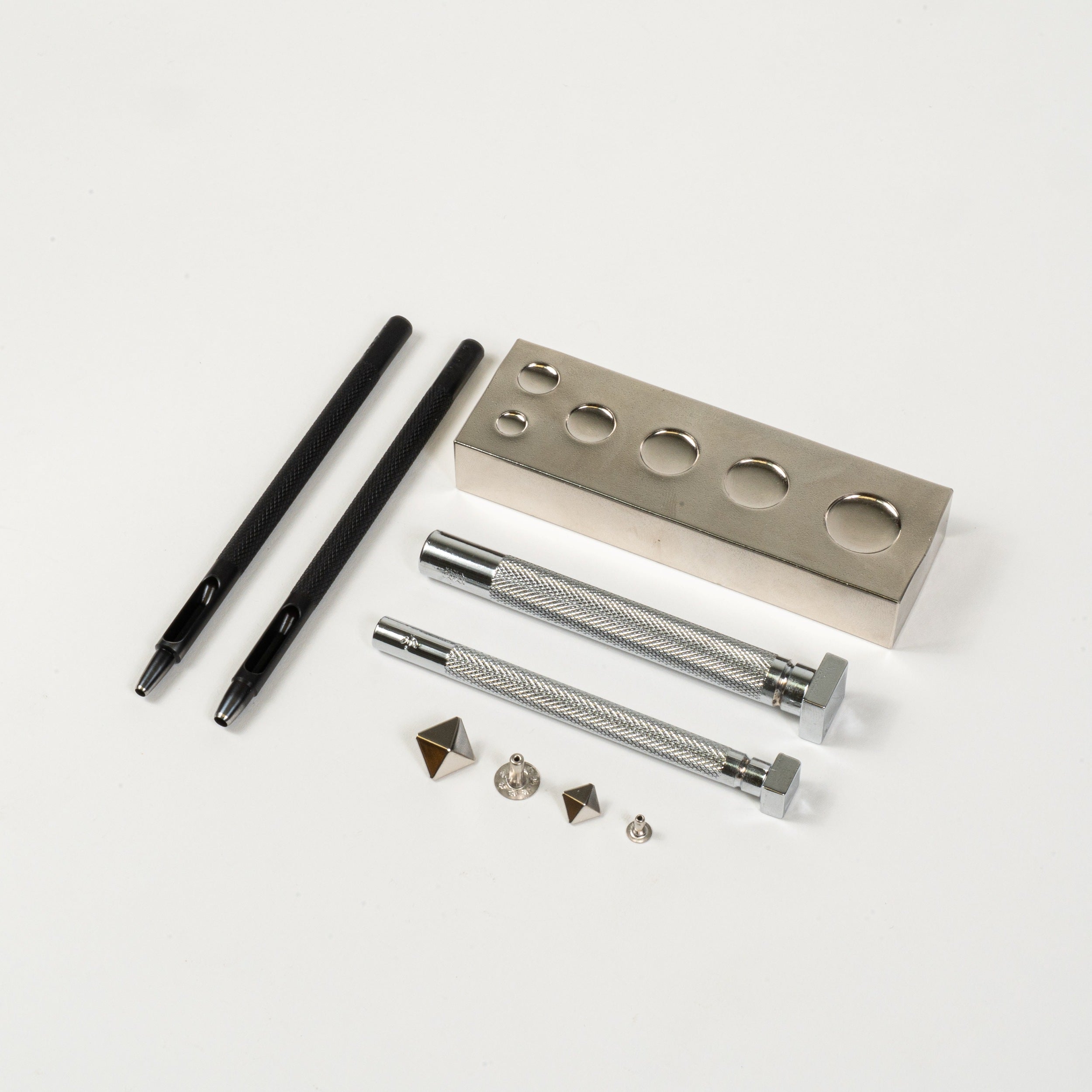pyramid rivet setter with anvil and round drive punch