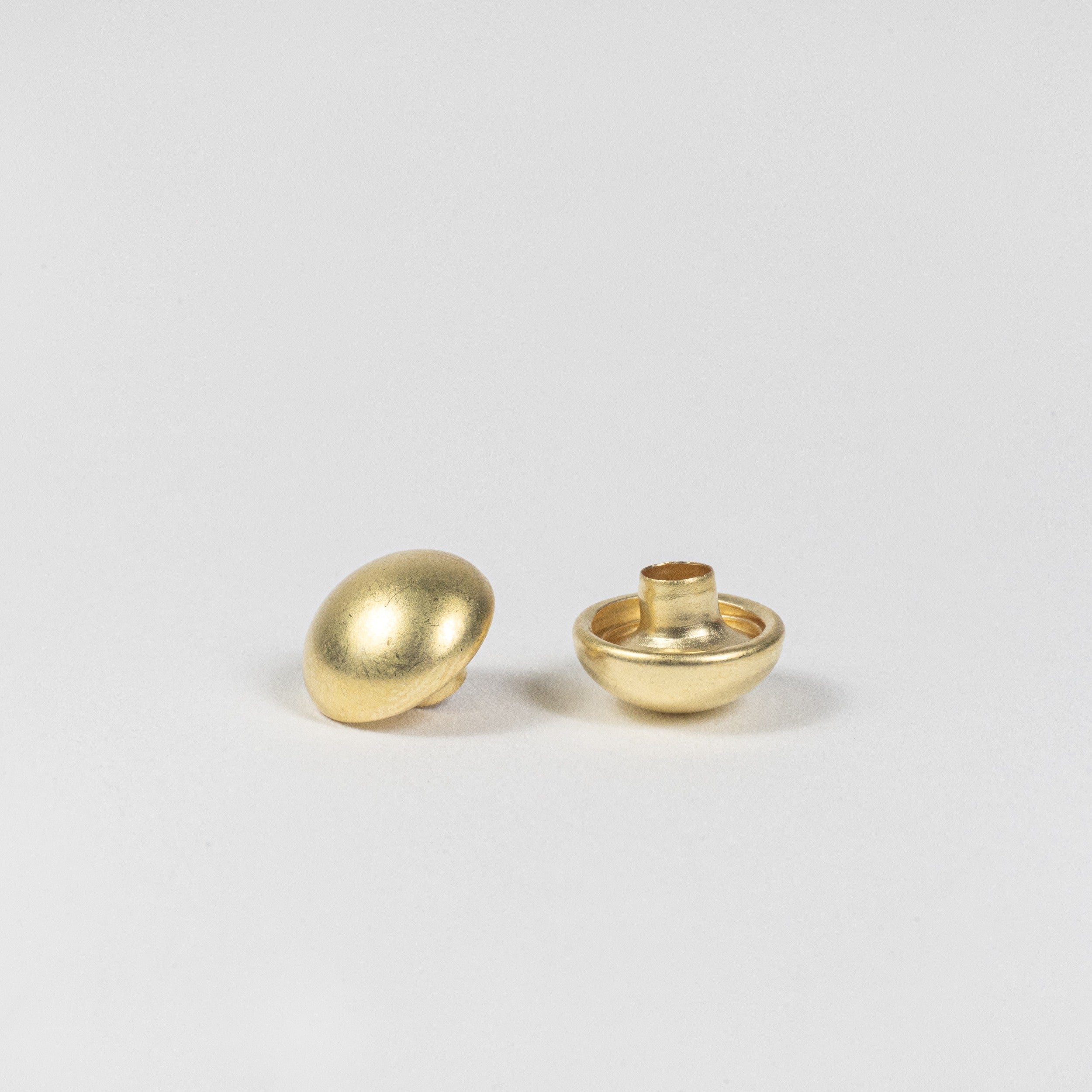 solid brass domed rivet cap front view