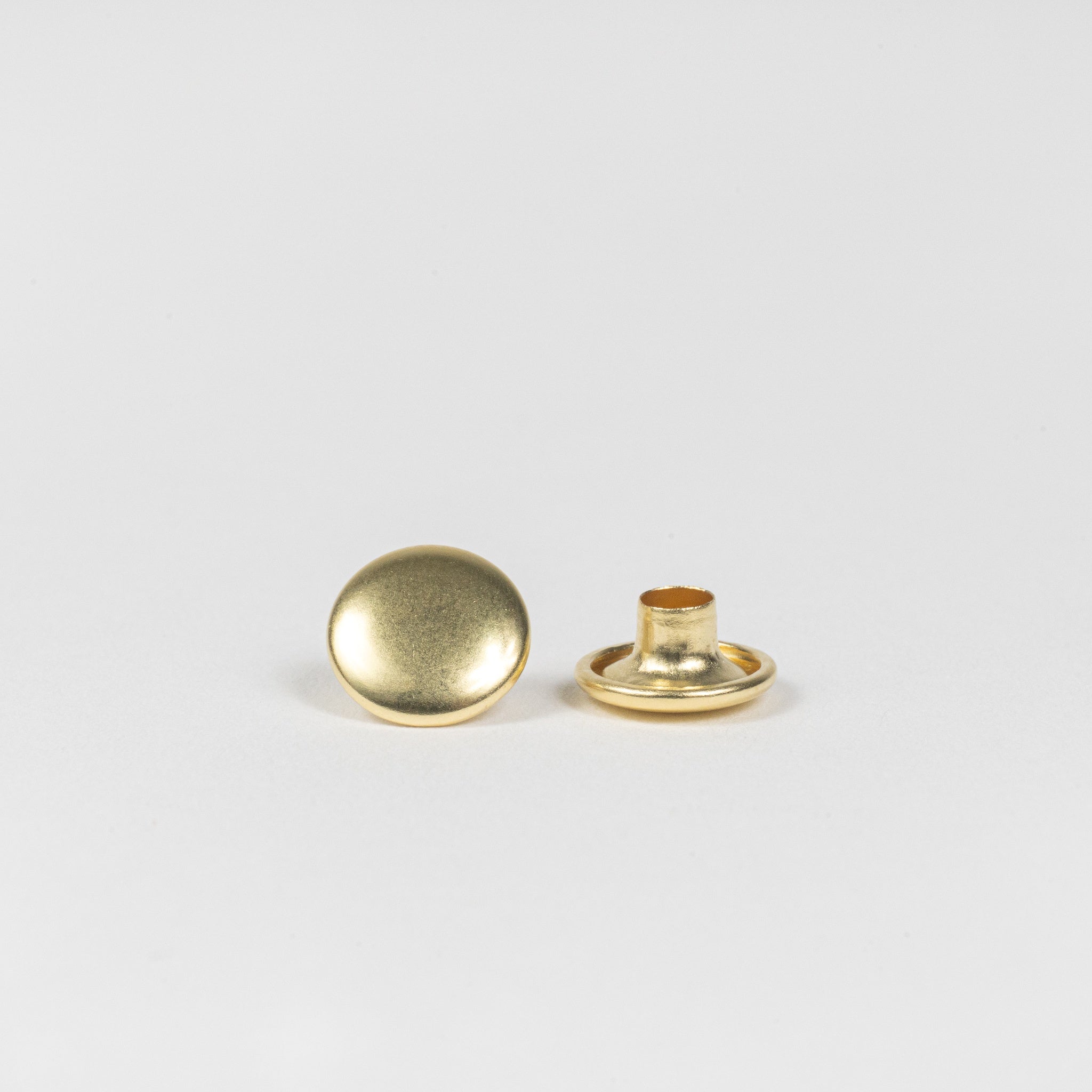 solid brass double cap rivets top and base view
