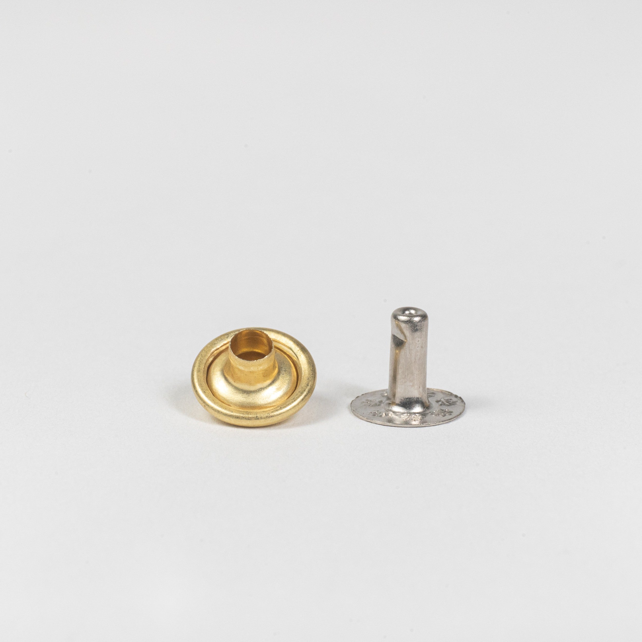 solid brass spike rivet front view