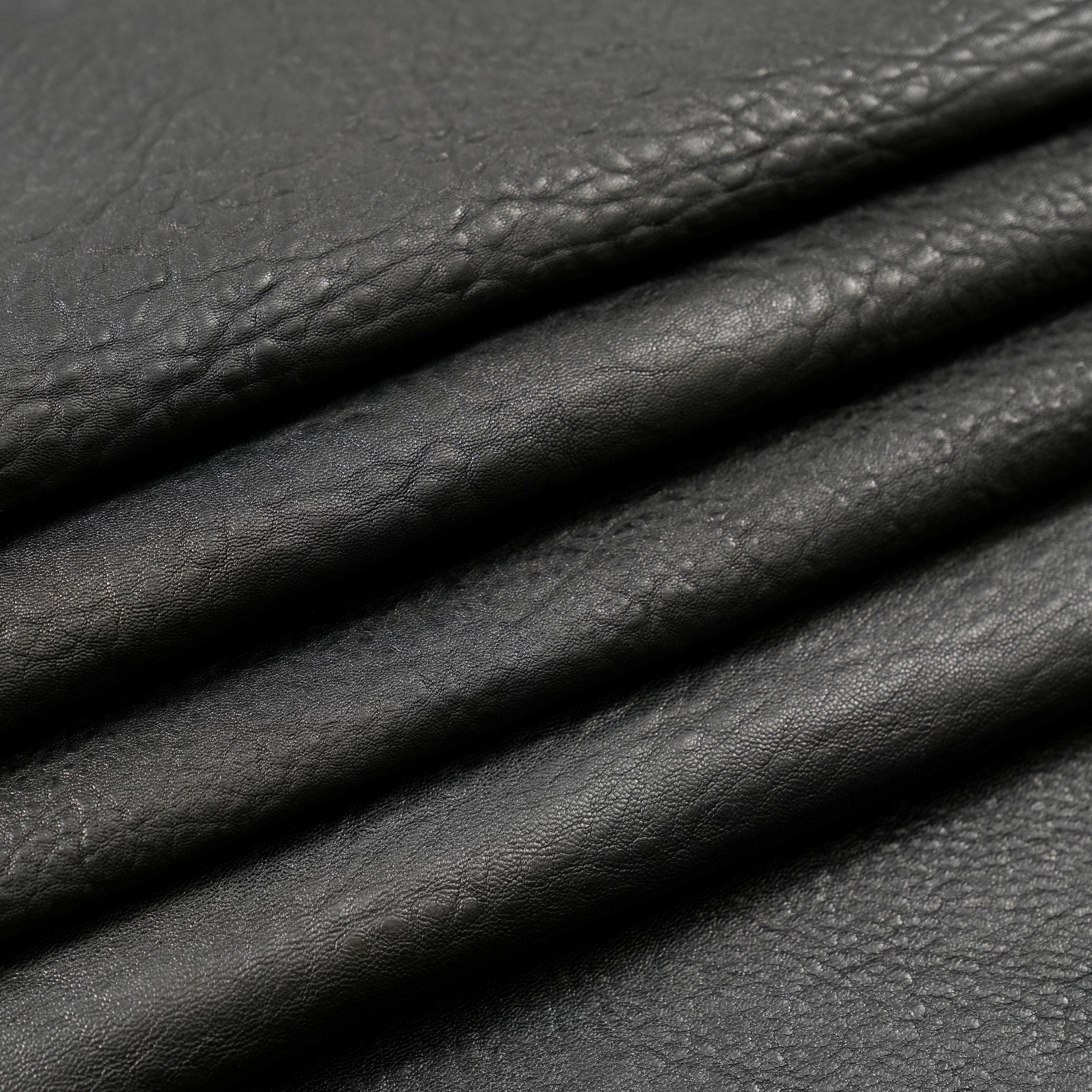 veg tan lambskin leather washed close up view black