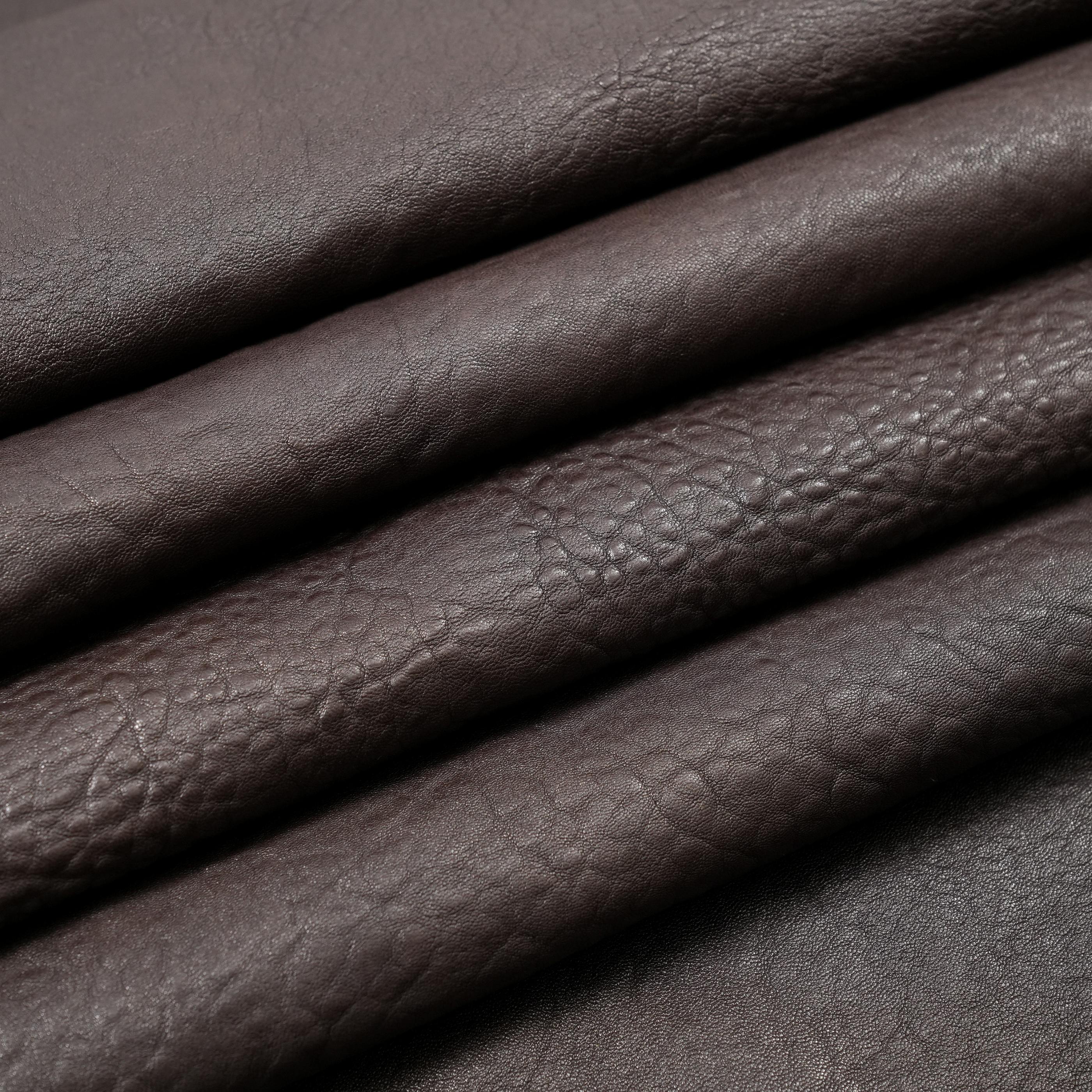 veg tan lambskin leather washed close up view dark brown