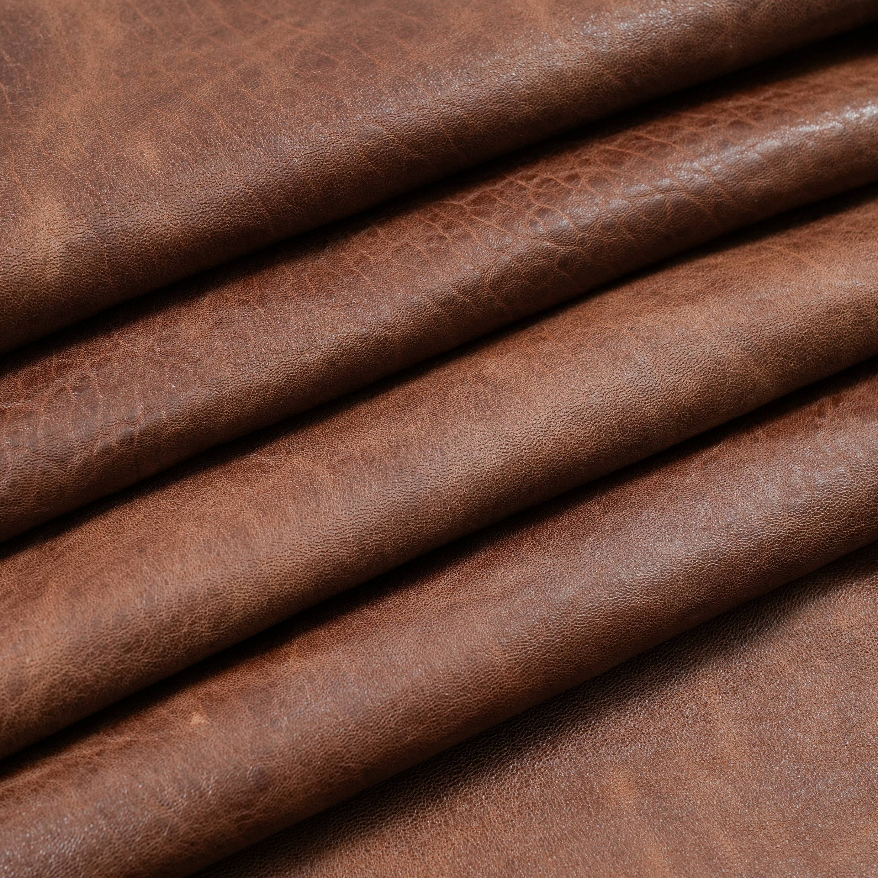 veg tan lambskin leather washed close up view medium brown
