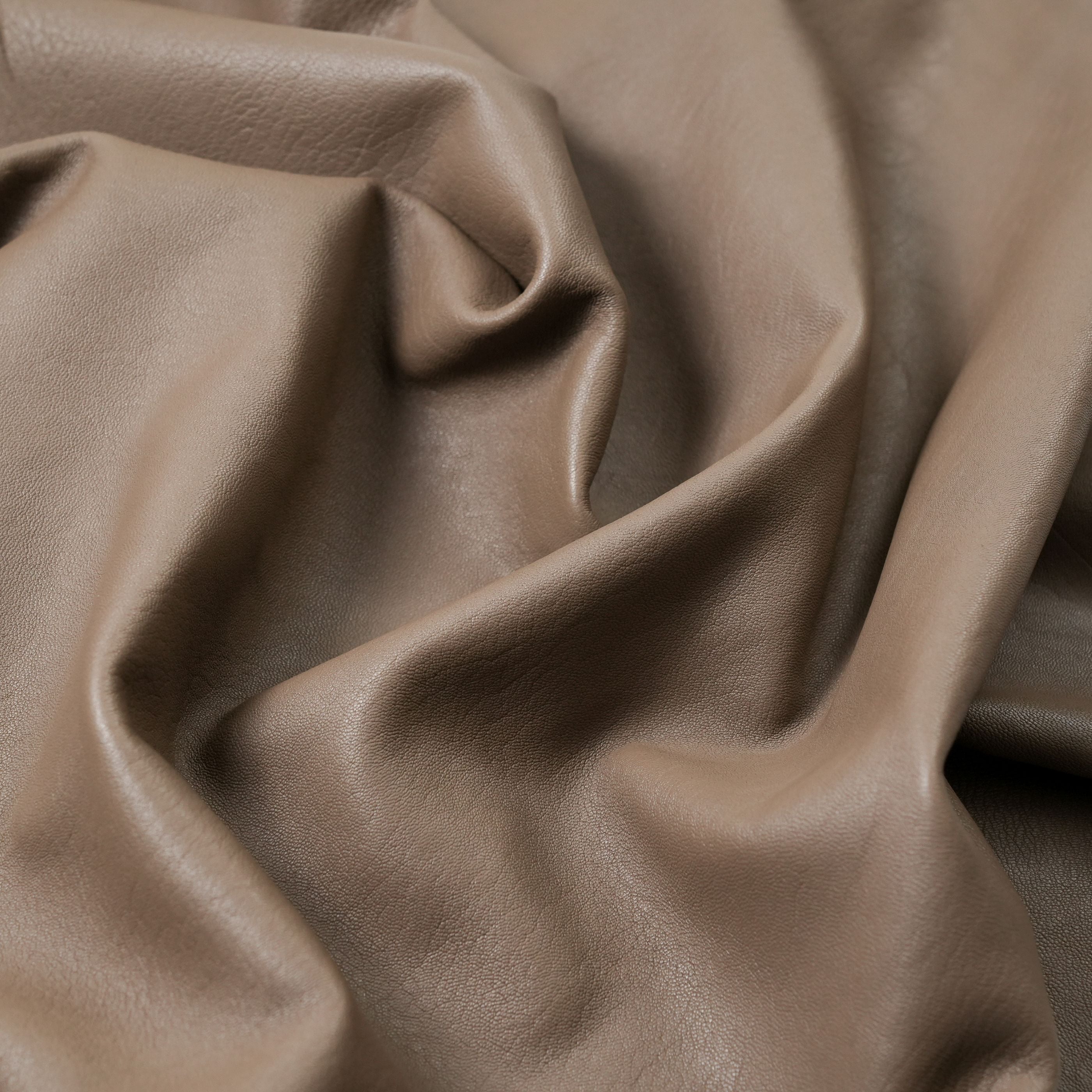 veg tan lambskin leather washed close up view taupe beige