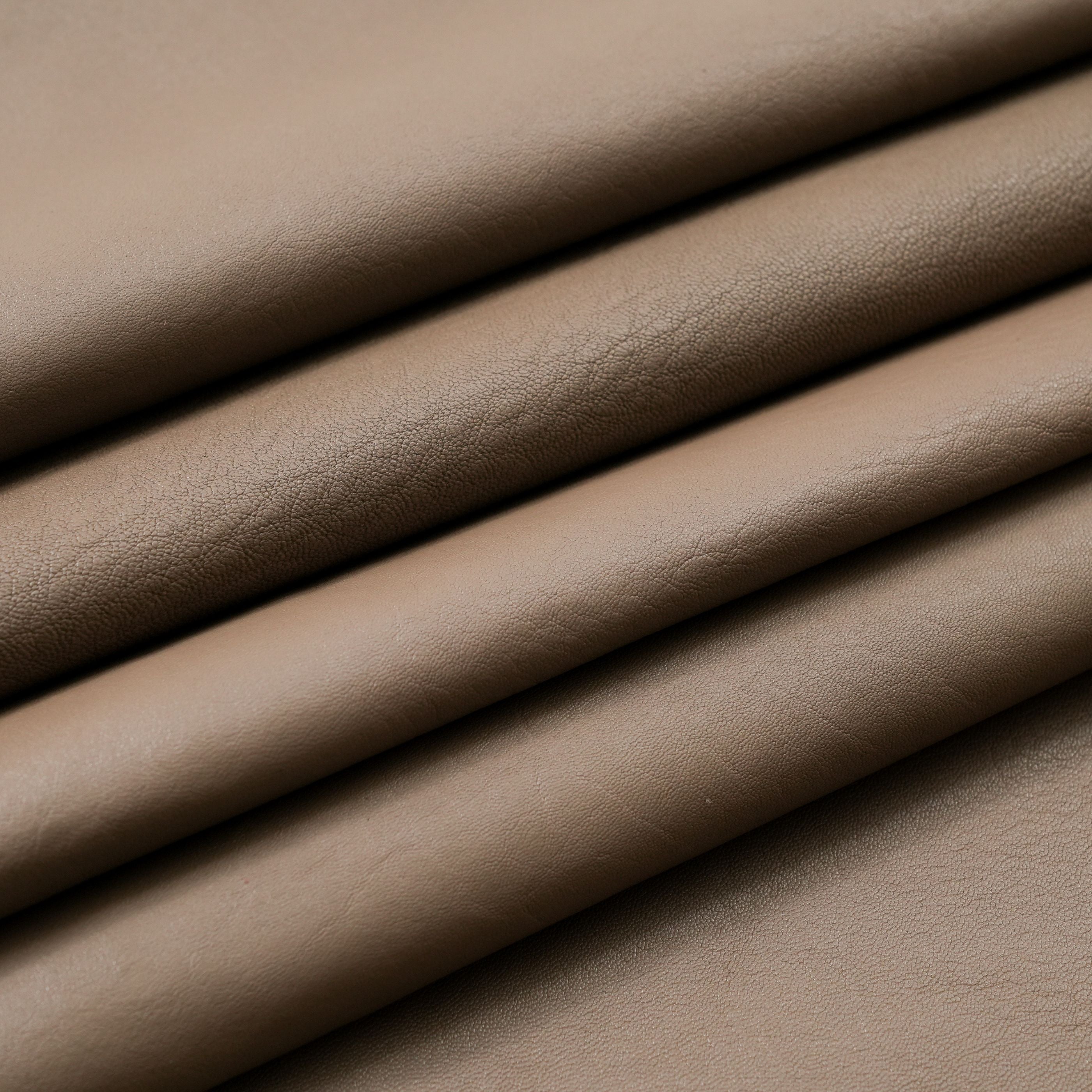 veg tan lambskin leather washed close up view taupe beige