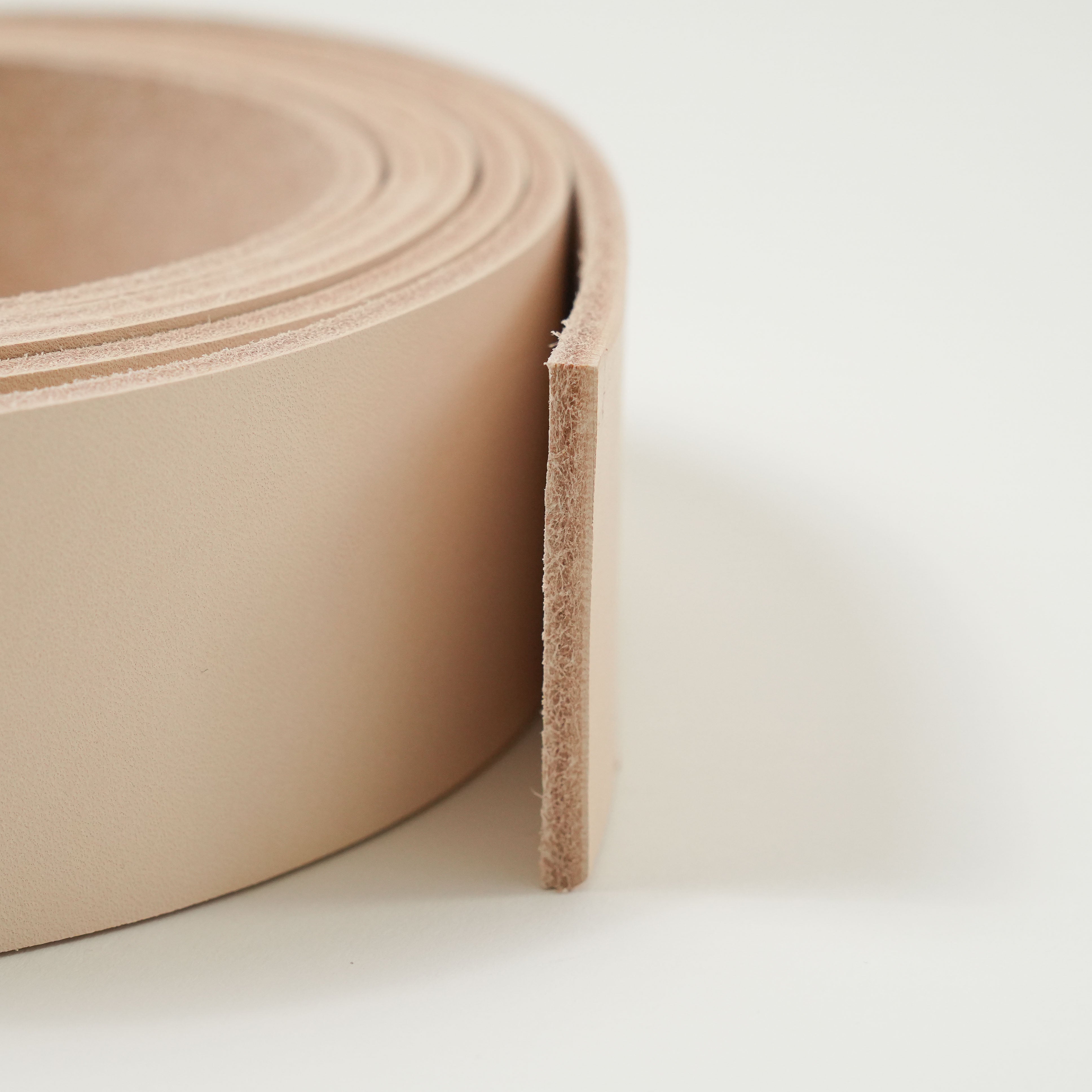 veg tan leather strip close up edge thickness 8-9-oz