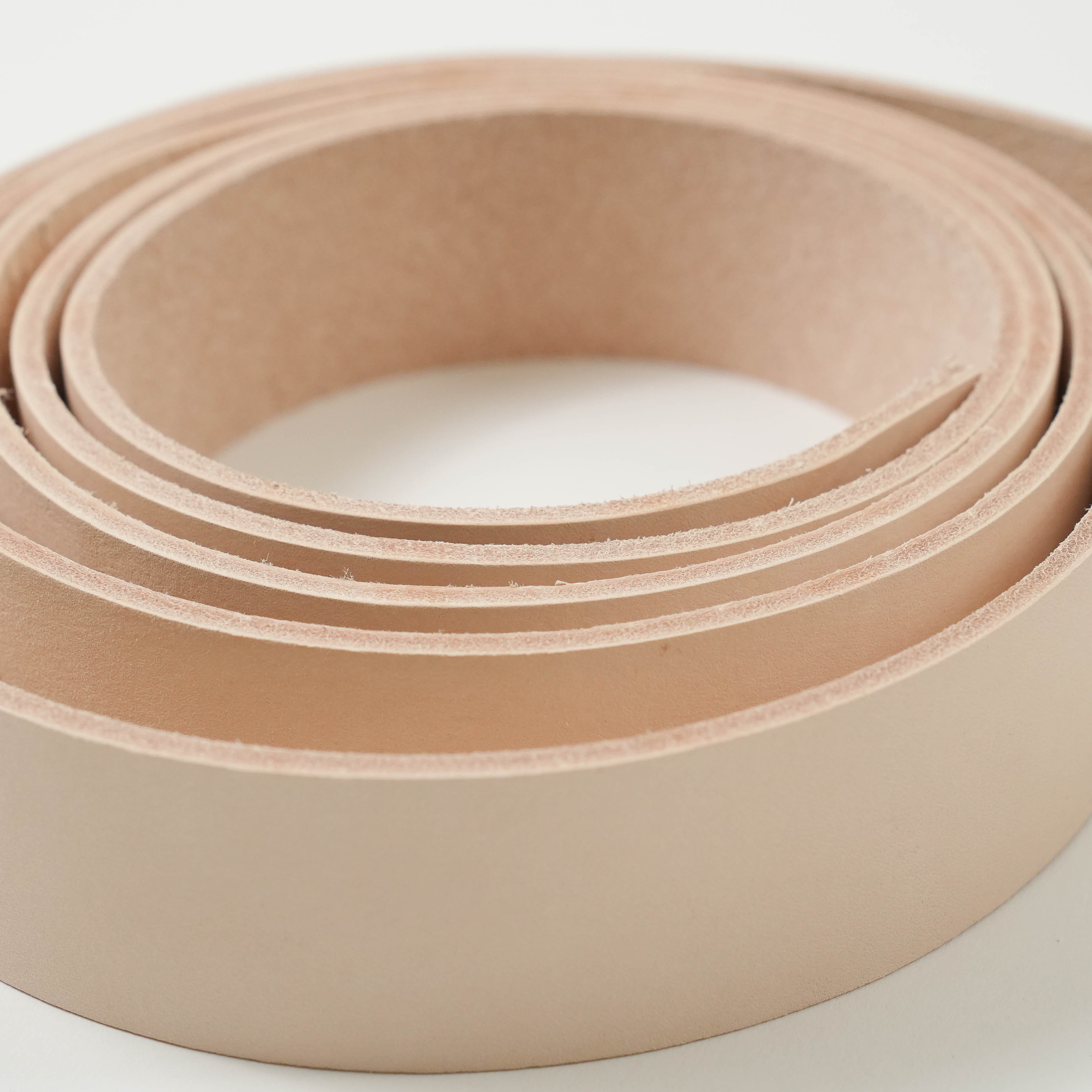veg tan leather strip roll close up view 8-9-oz
