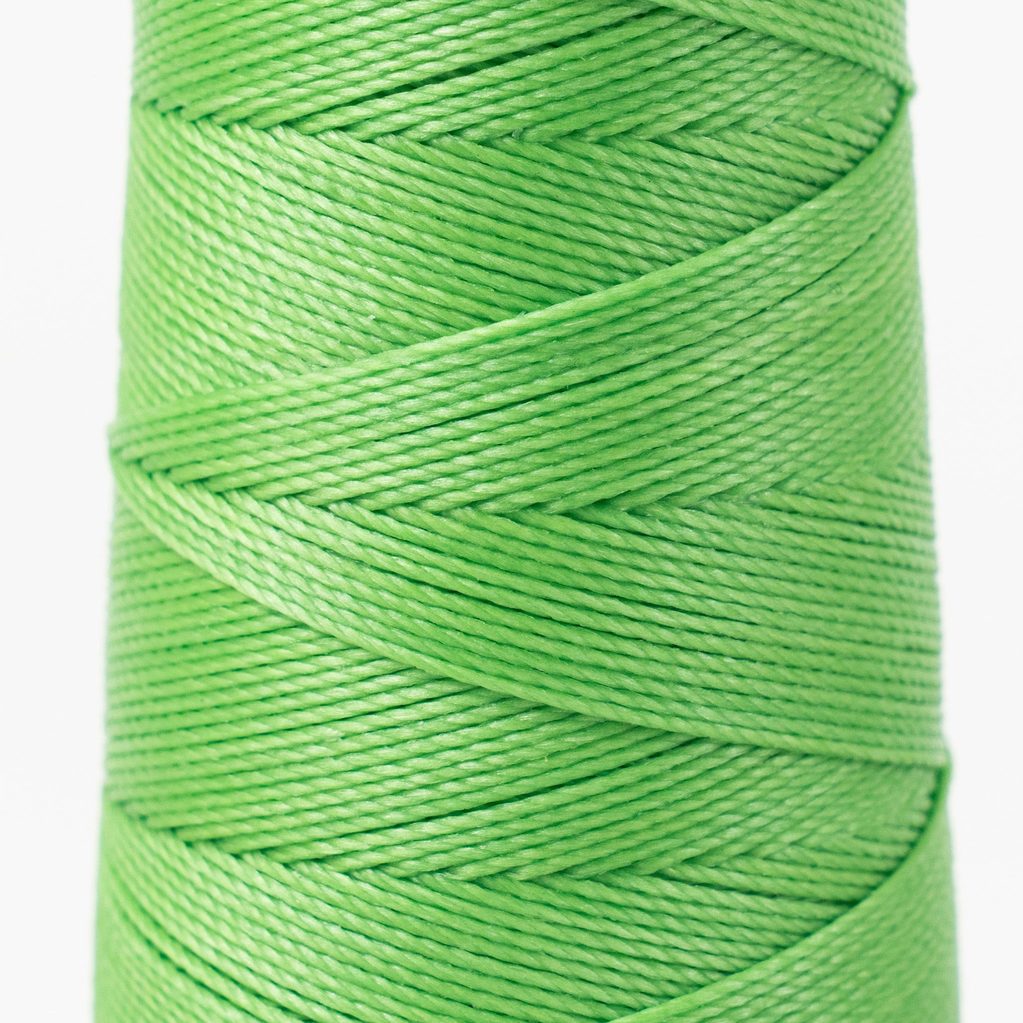 Close-up of MBT apple green waxed polyester thread