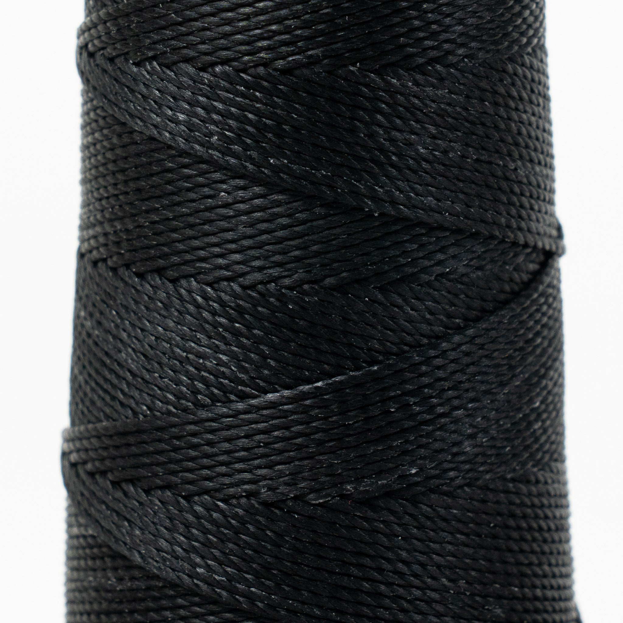 Close-up of MBT black waxed polyester thread
